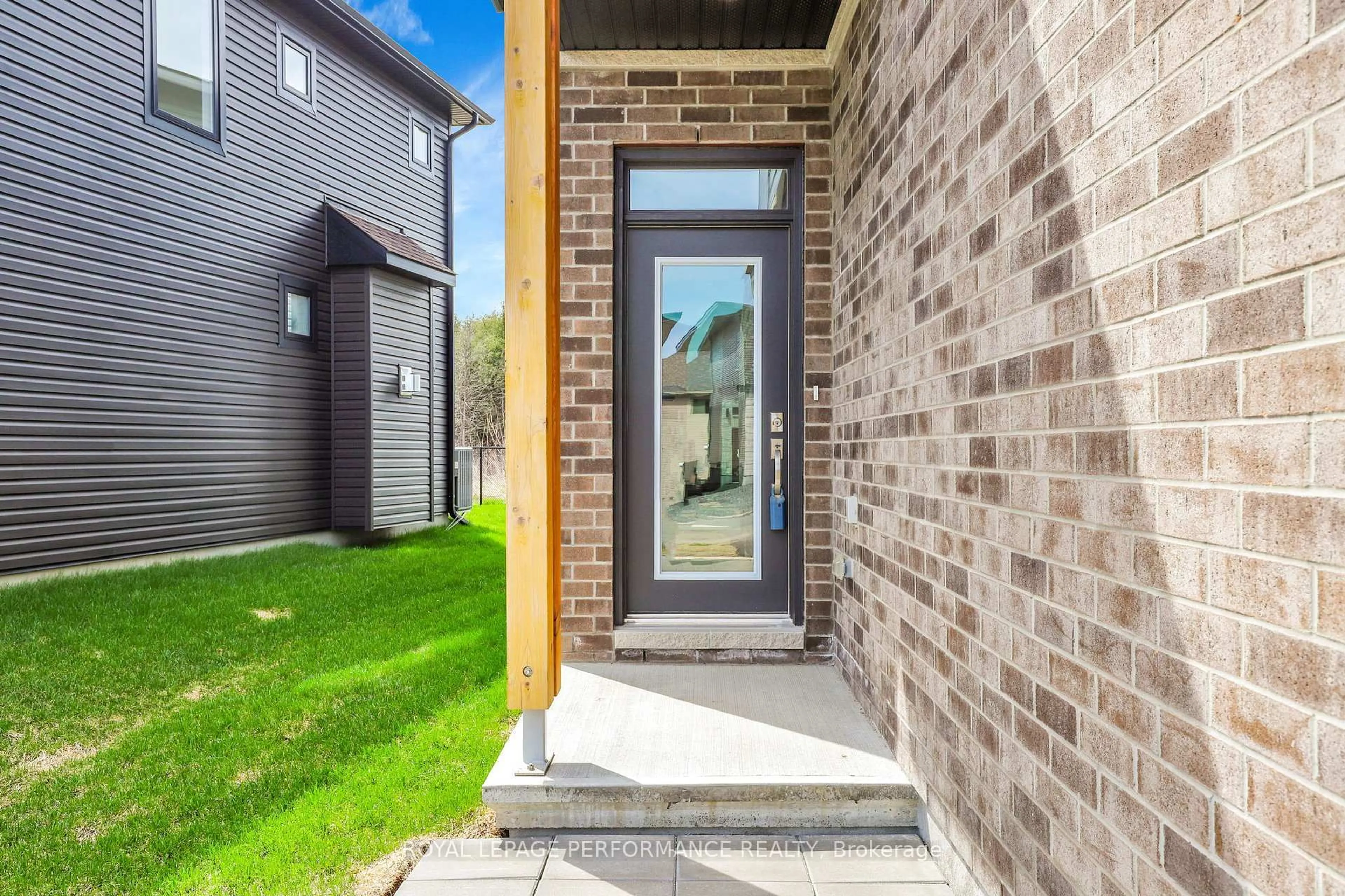Home with brick exterior material, street for 619 Paakanaak Ave, Ottawa Ontario K1X 0J6