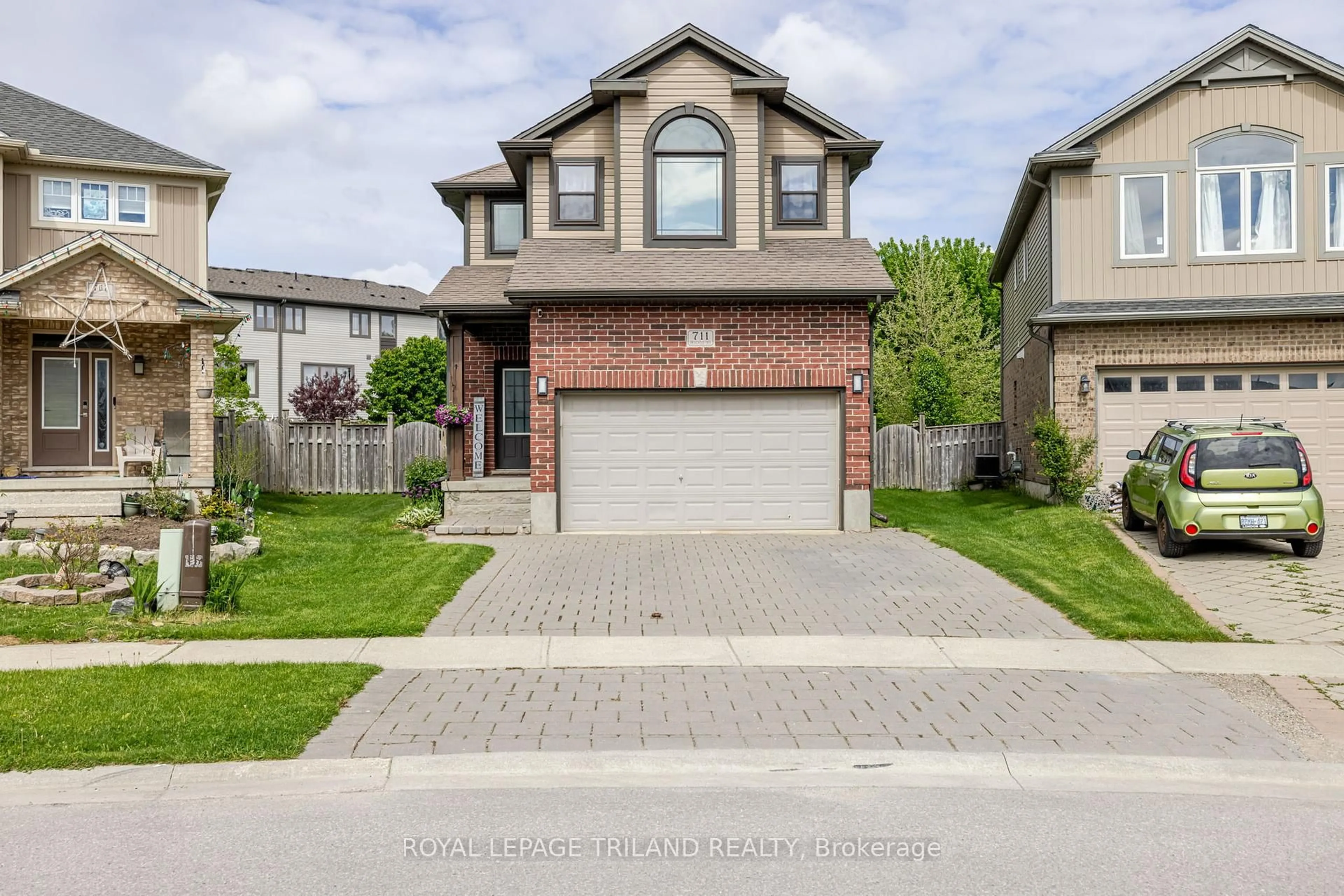 Home with brick exterior material, street for 711 Springwood Cres, London North Ontario N6G 0H8