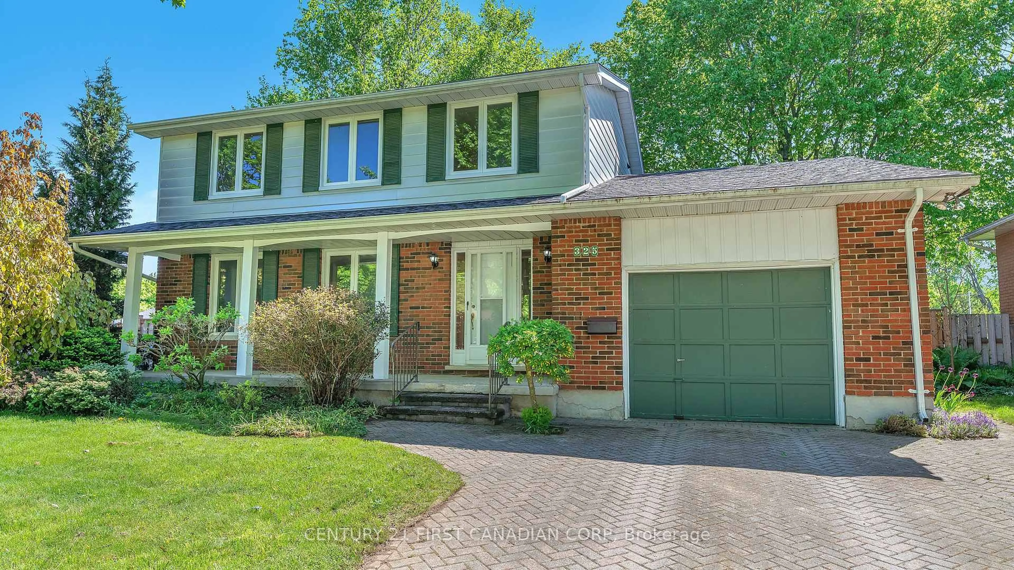Home with brick exterior material, street for 325 Helen Dr, Strathroy-Caradoc Ontario N7G 3M6