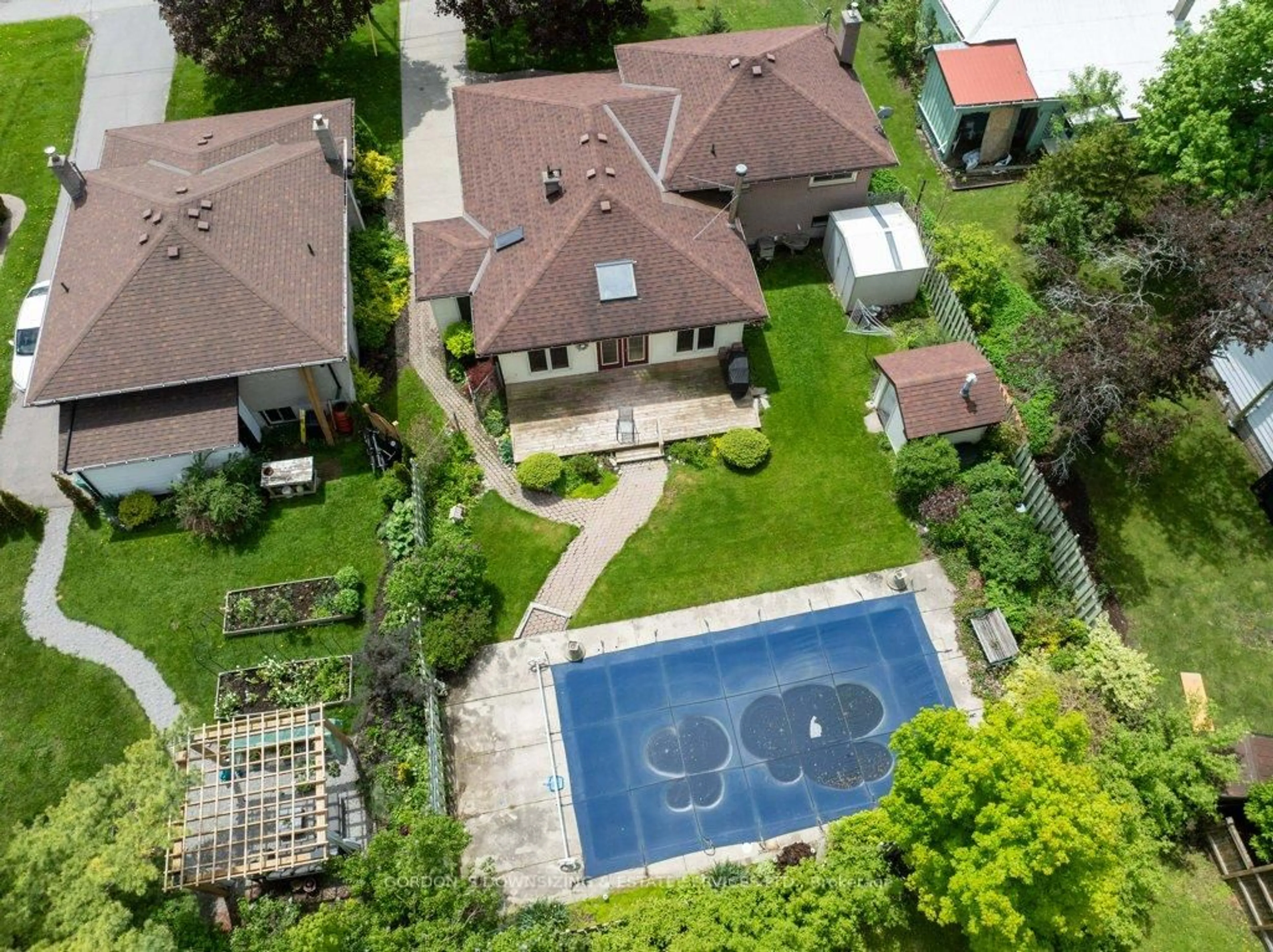 A pic from outside/outdoor area/front of a property/back of a property/a pic from drone, street for 13 Low St, Prince Edward County Ontario K0K 2T0