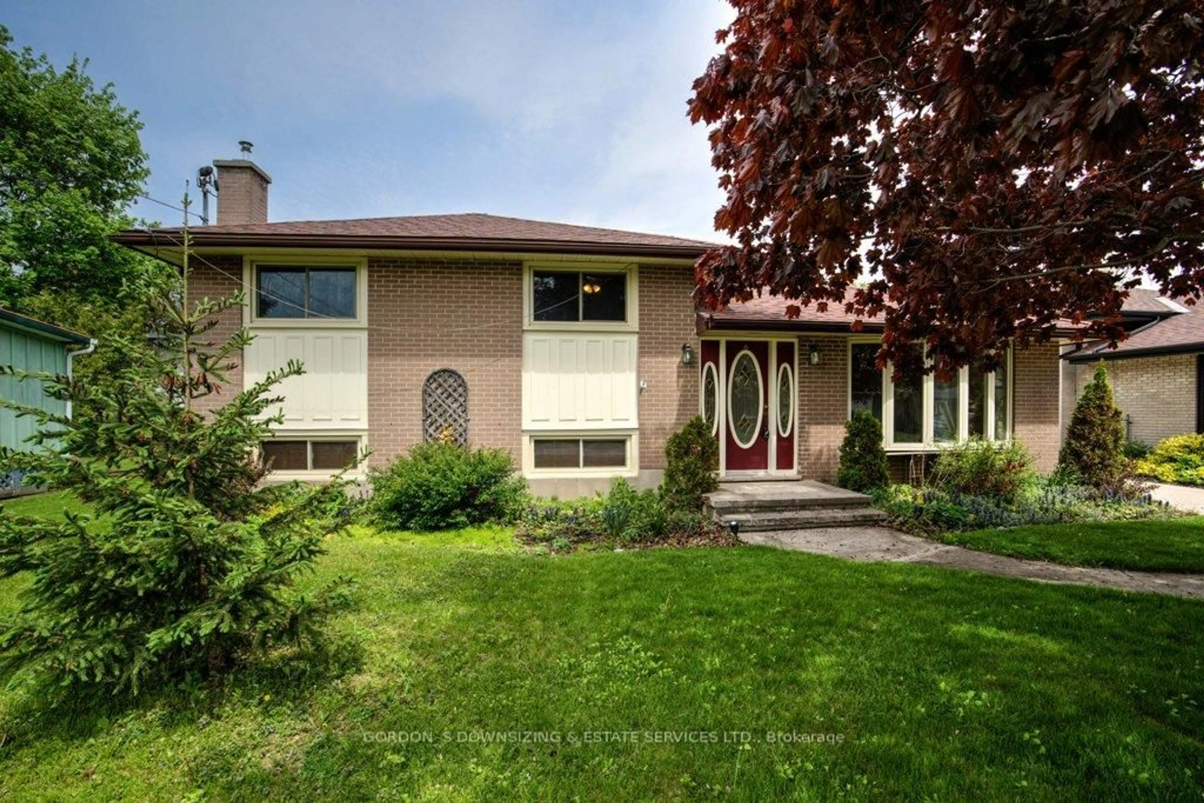 Home with vinyl exterior material, street for 13 Low St, Prince Edward County Ontario K0K 2T0