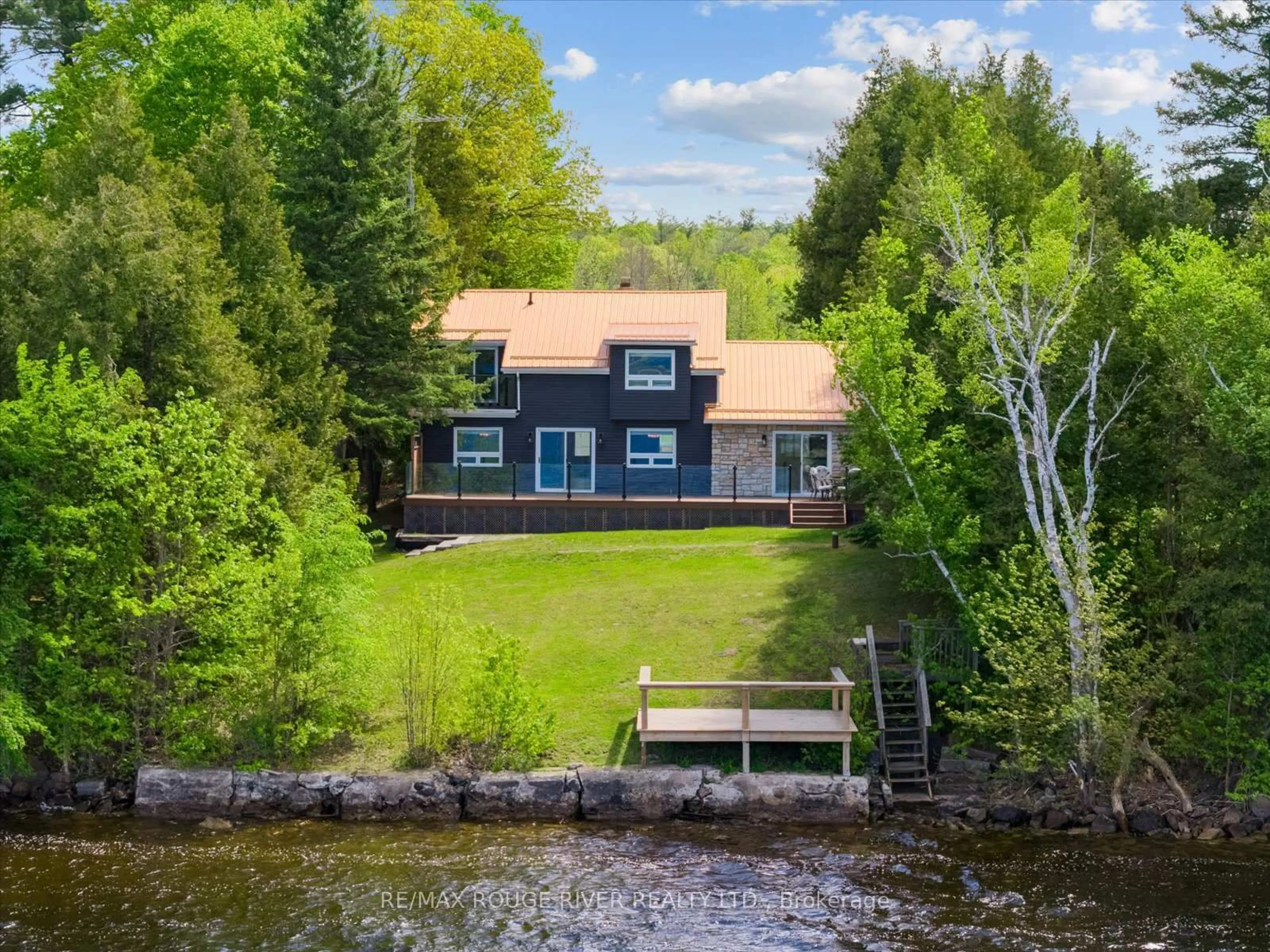 A pic from outside/outdoor area/front of a property/back of a property/a pic from drone, water/lake/river/ocean view for 433 Marble Point Rd, Limoges Ontario K0K 2M0