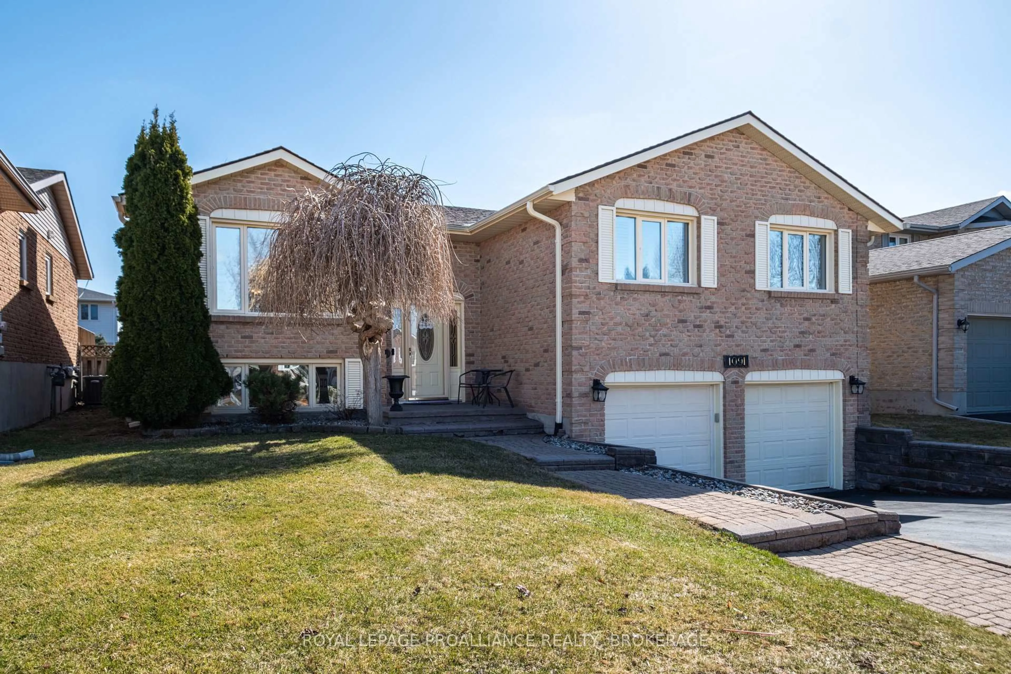 Home with brick exterior material, street for 1091 Palmerston Cres, Kingston Ontario K7P 2P5