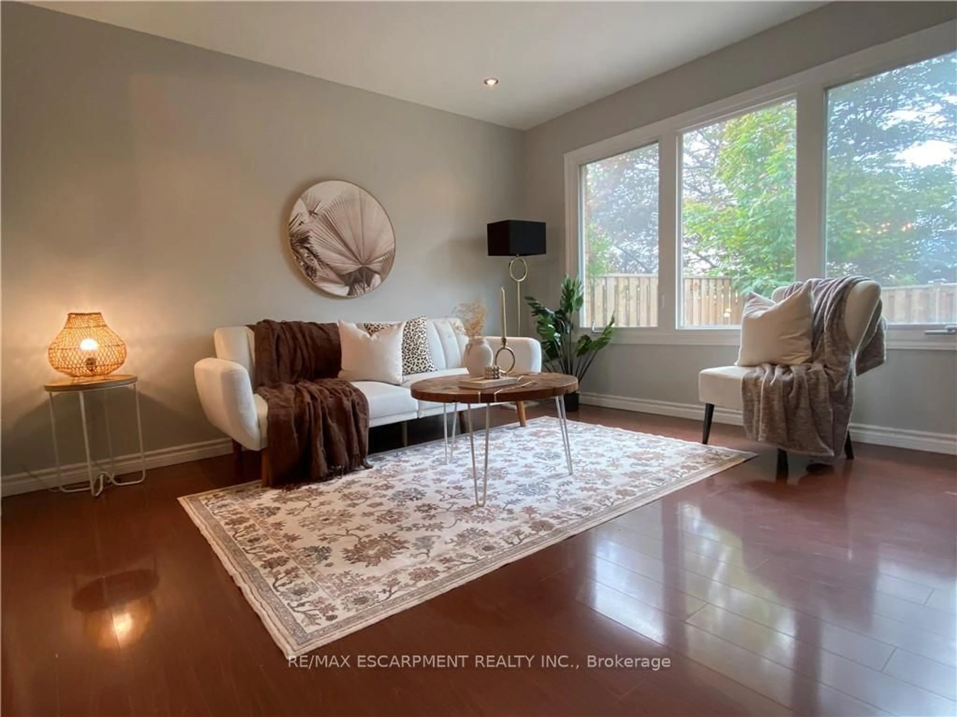 Living room with furniture, unknown for 1025 Upper Gage Ave #3, Hamilton Ontario L8V 4L2