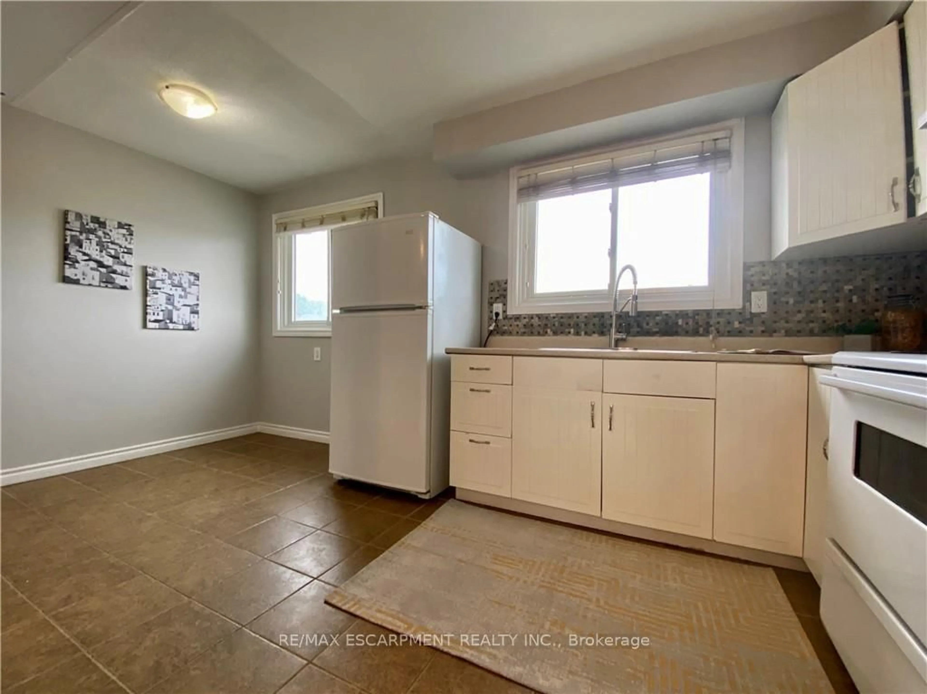 Standard kitchen, ceramic/tile floor for 1025 Upper Gage Ave #3, Hamilton Ontario L8V 4L2