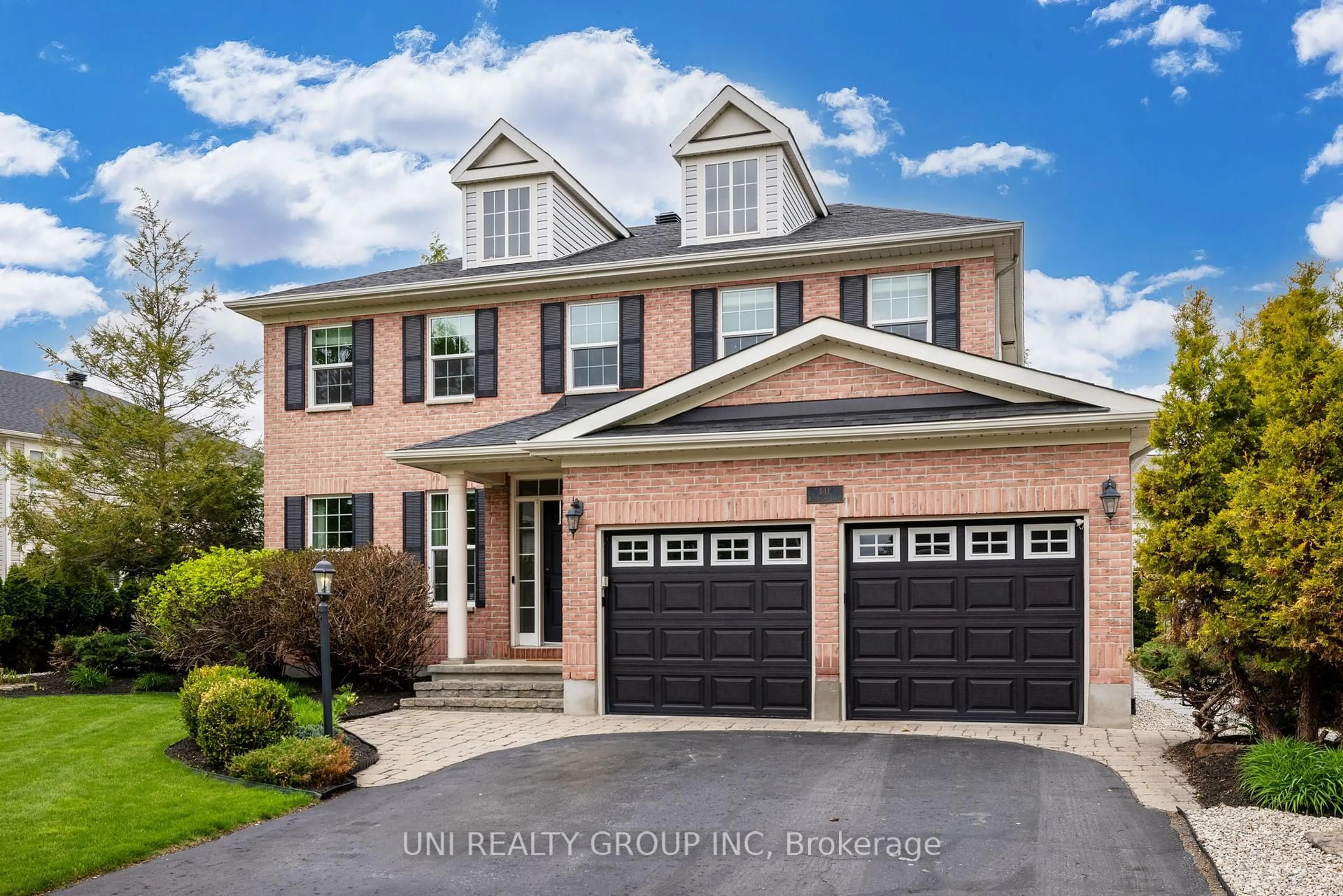 Home with brick exterior material, street for 141 Riverstone Dr, Ottawa Ontario K2J 5E5