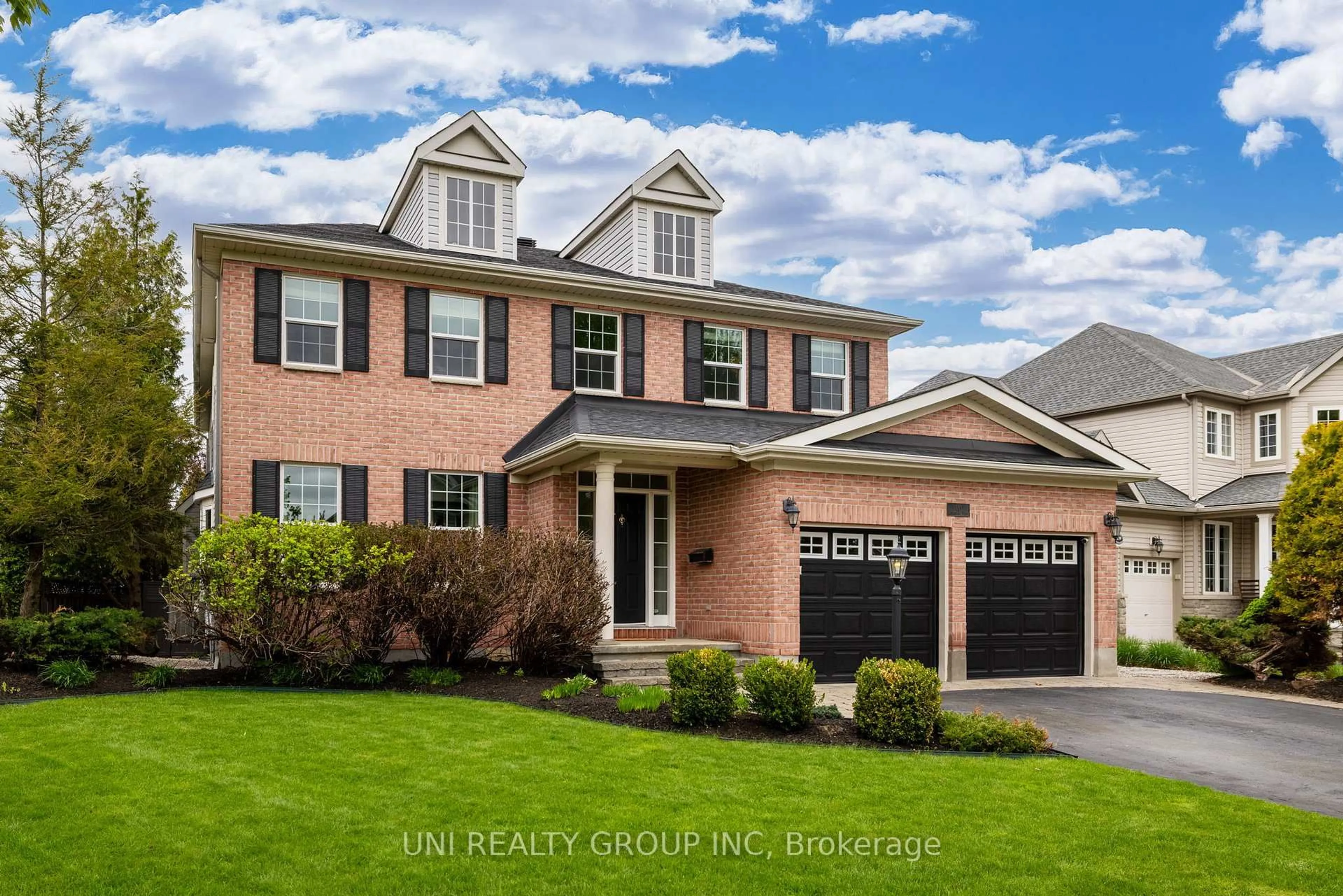 Home with brick exterior material, street for 141 Riverstone Dr, Ottawa Ontario K2J 5E5