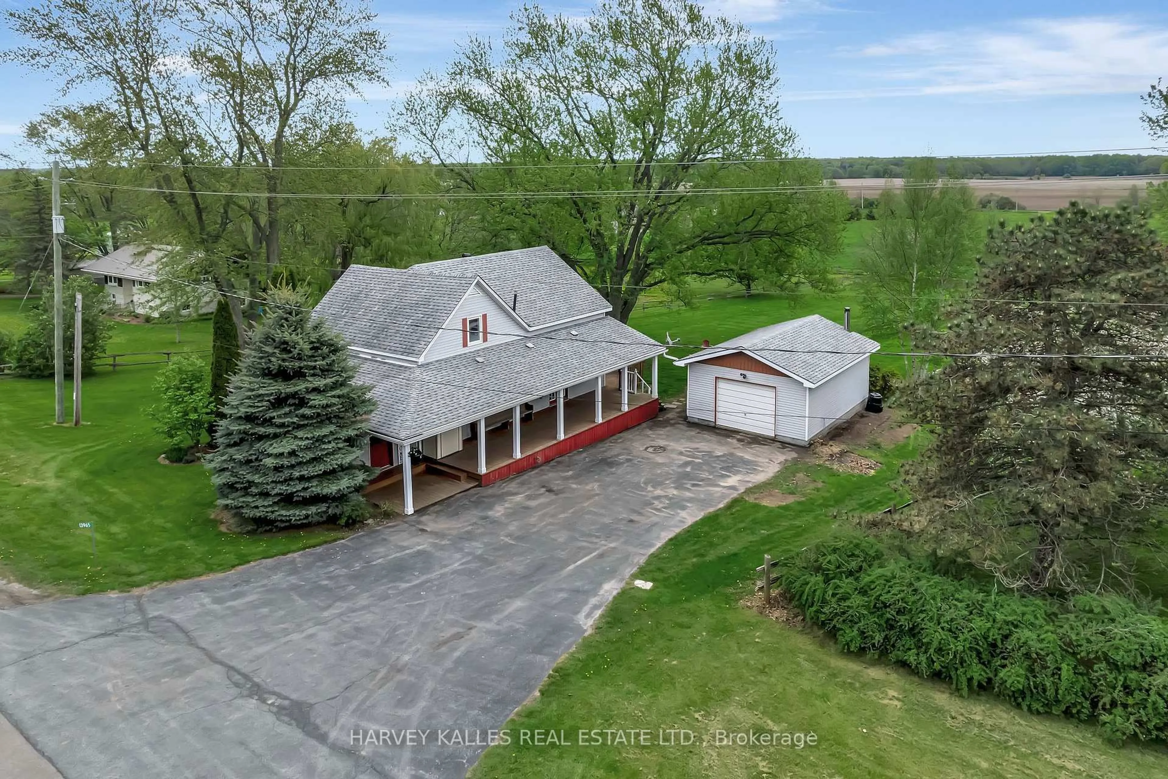 A pic from outside/outdoor area/front of a property/back of a property/a pic from drone, water/lake/river/ocean view for 13965 Loyalist Pkwy, Prince Edward County Ontario K0K 2T0