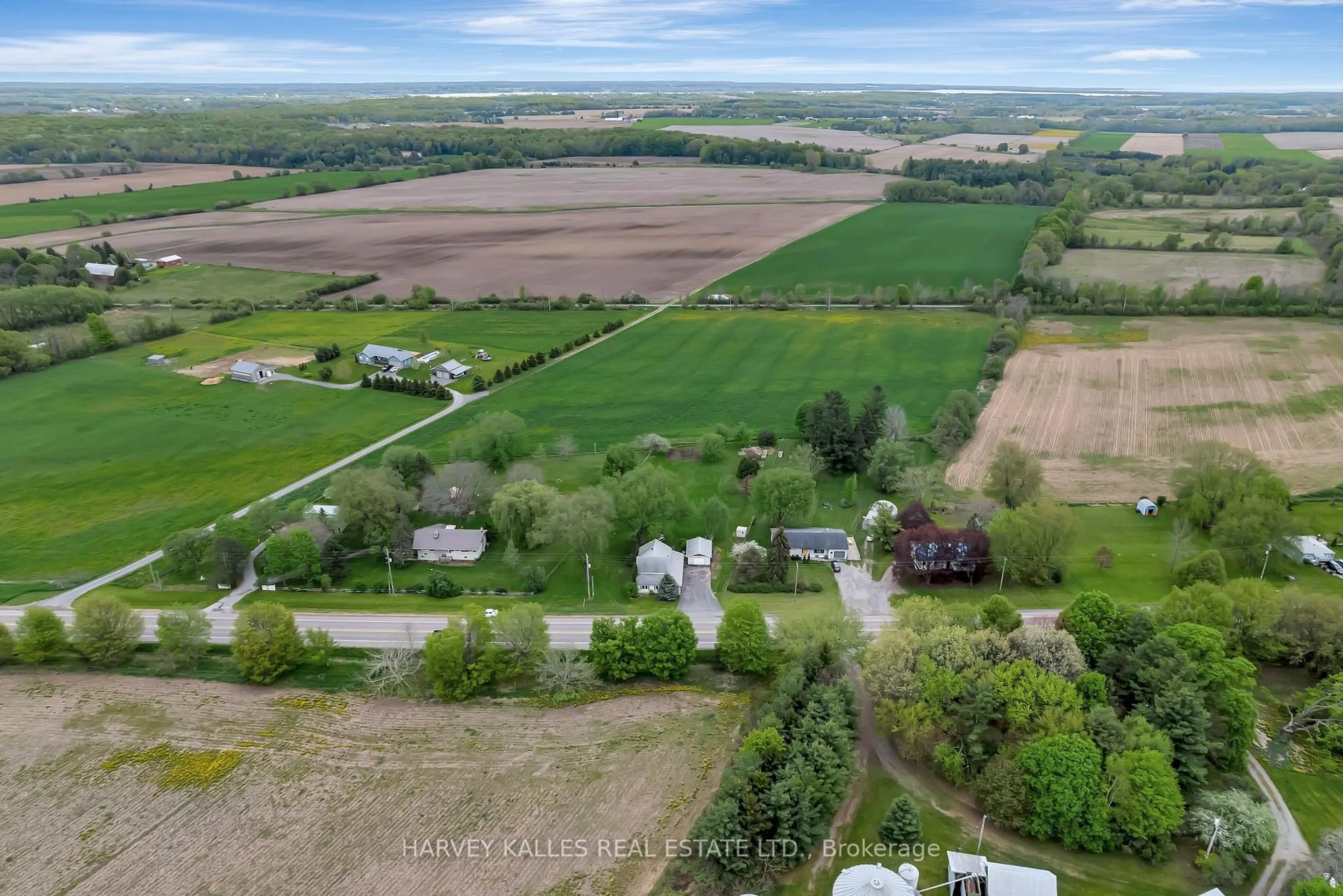 A pic from outside/outdoor area/front of a property/back of a property/a pic from drone, street for 13965 Loyalist Pkwy, Prince Edward County Ontario K0K 2T0