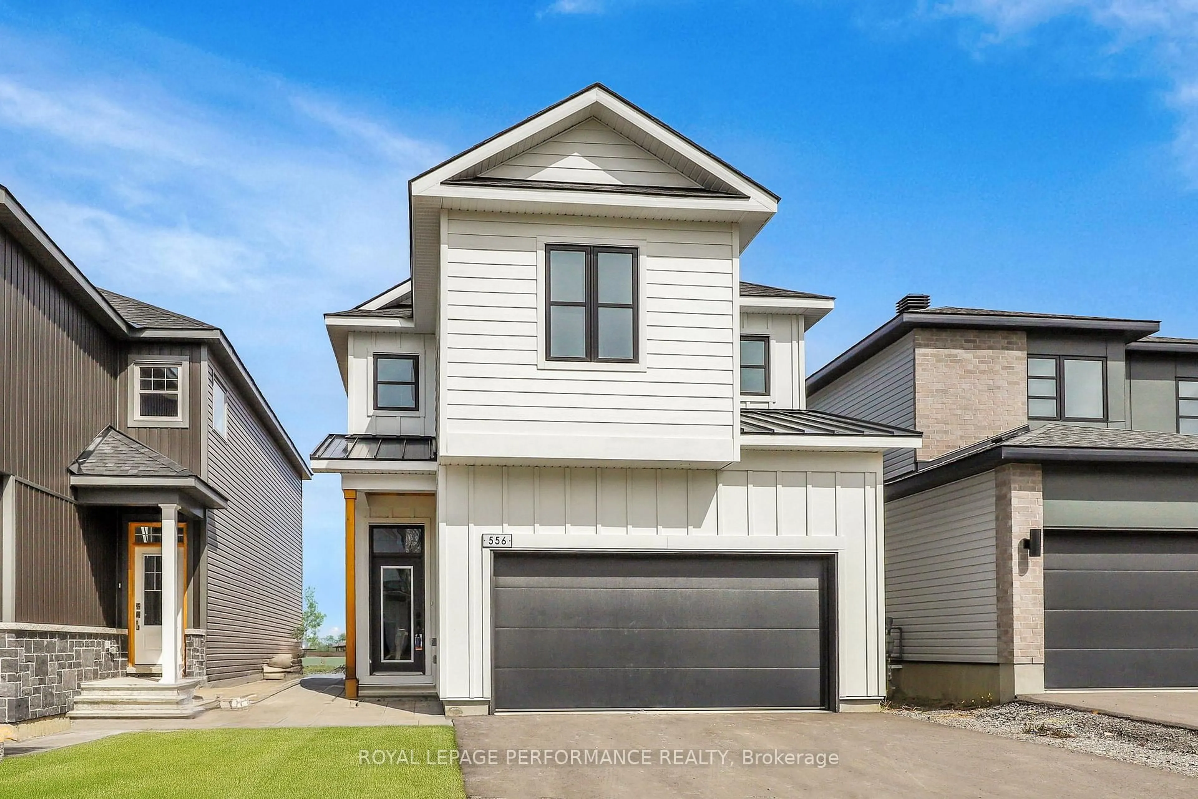 Home with vinyl exterior material, street for 556 Paakanaak Ave, Ottawa Ontario K1X 0H4