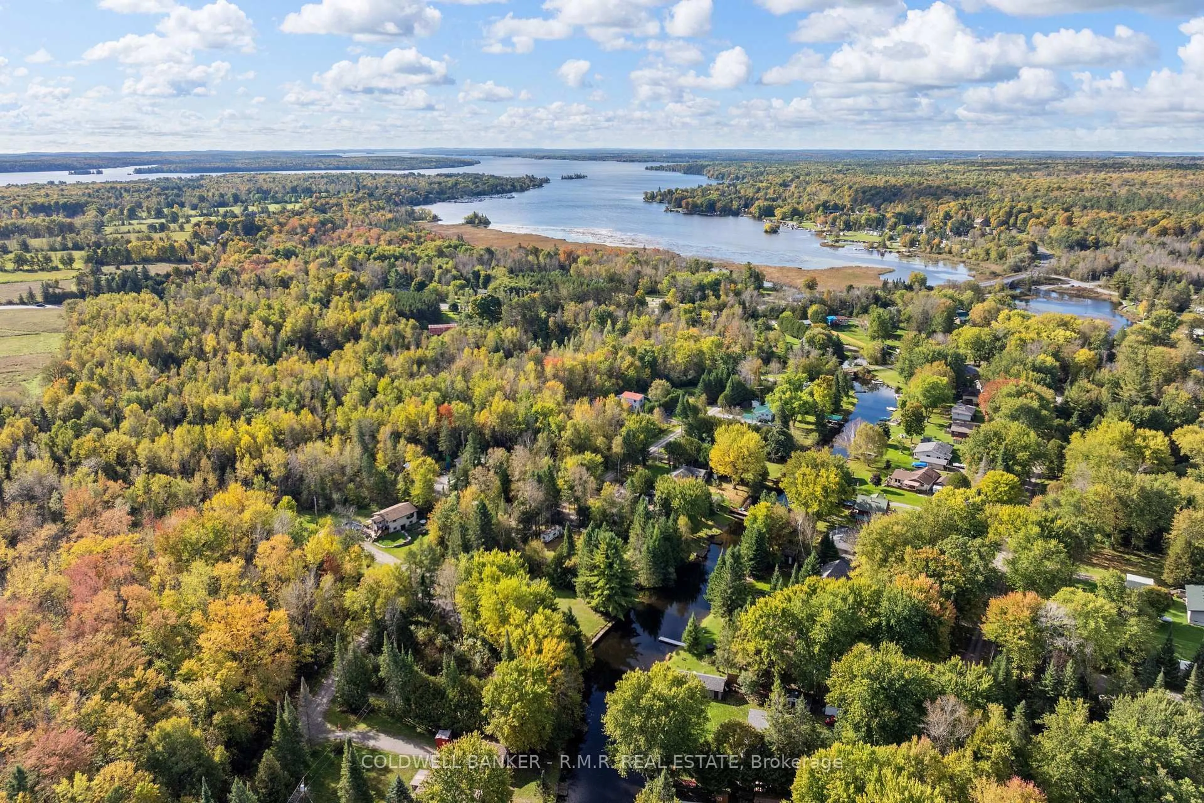 A pic from outside/outdoor area/front of a property/back of a property/a pic from drone, water/lake/river/ocean view for 57 Fire Route 104, Trent Lakes Ontario K0M 1A0