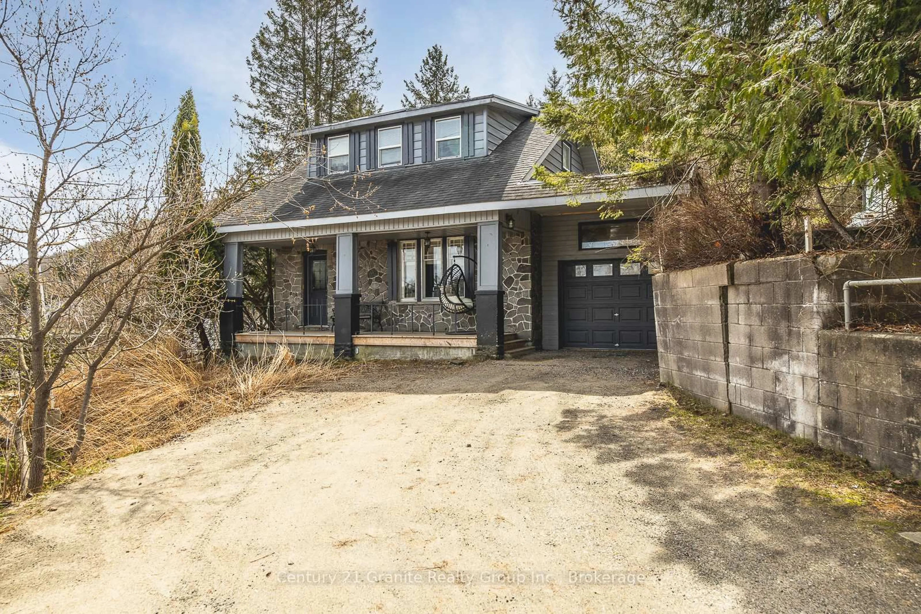 Home with brick exterior material, street for 690 Mountain St, Dysart et al Ontario K0M 1S0