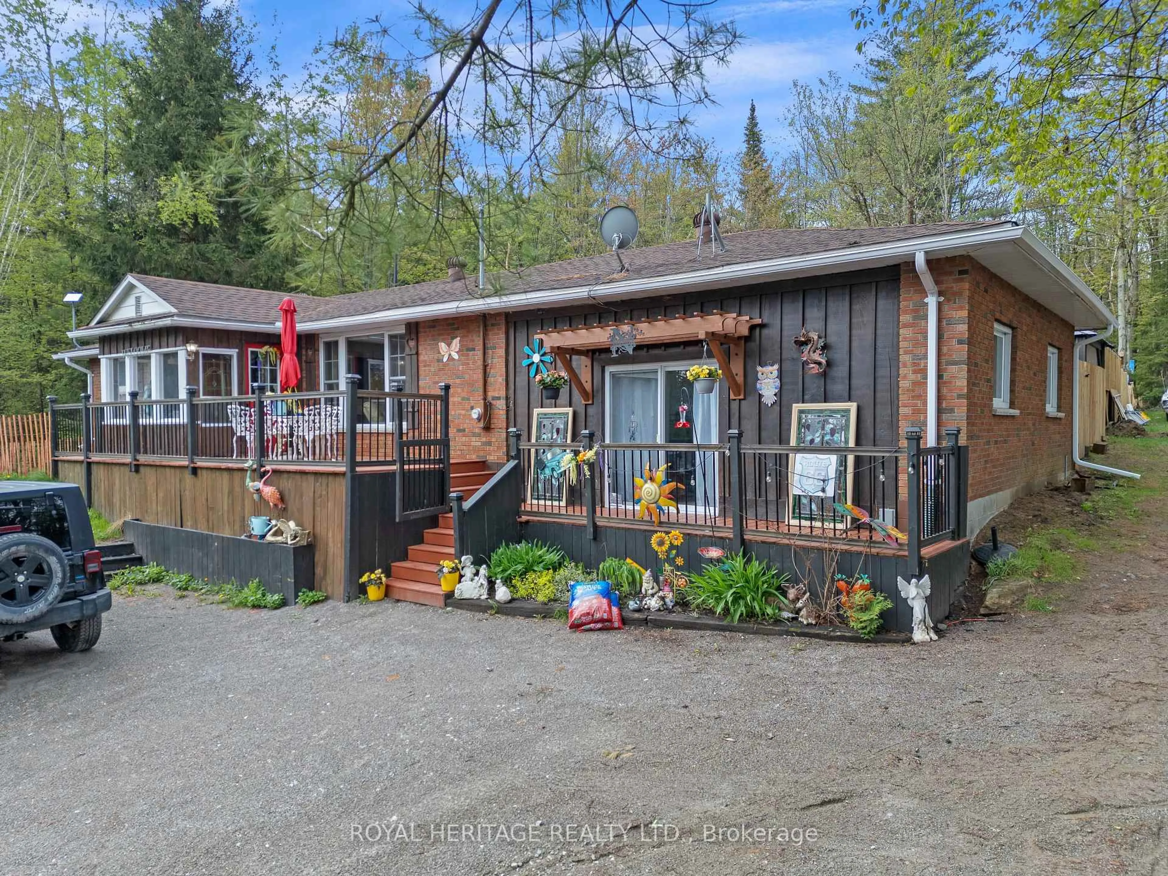 A pic from outside/outdoor area/front of a property/back of a property/a pic from drone, unknown for 26 Reid Rd, Trent Lakes Ontario K0M 2A0