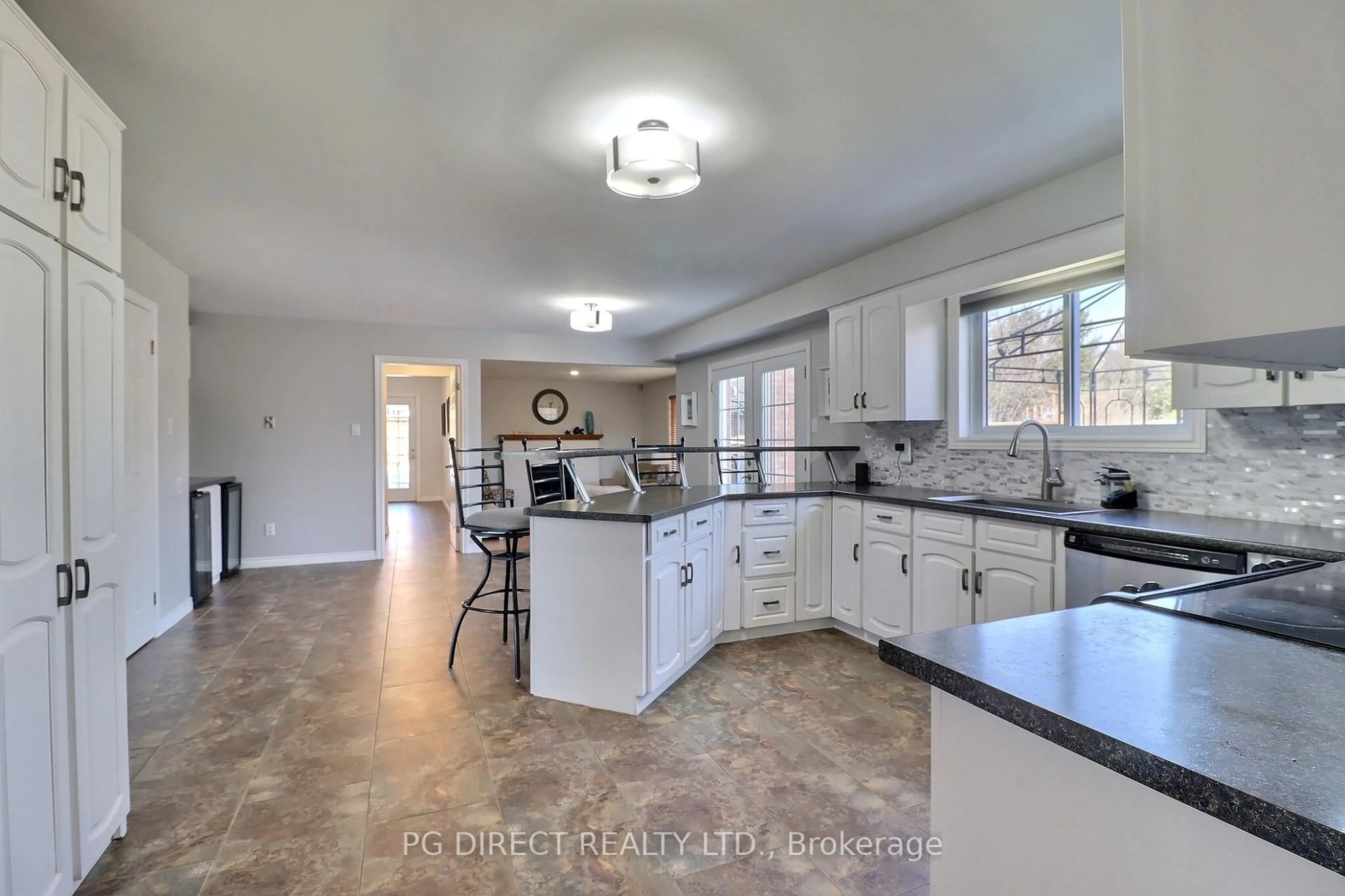 Open concept kitchen, ceramic/tile floor for 68 Westbrook Cres, Middlesex Centre Ontario N0L 1R0