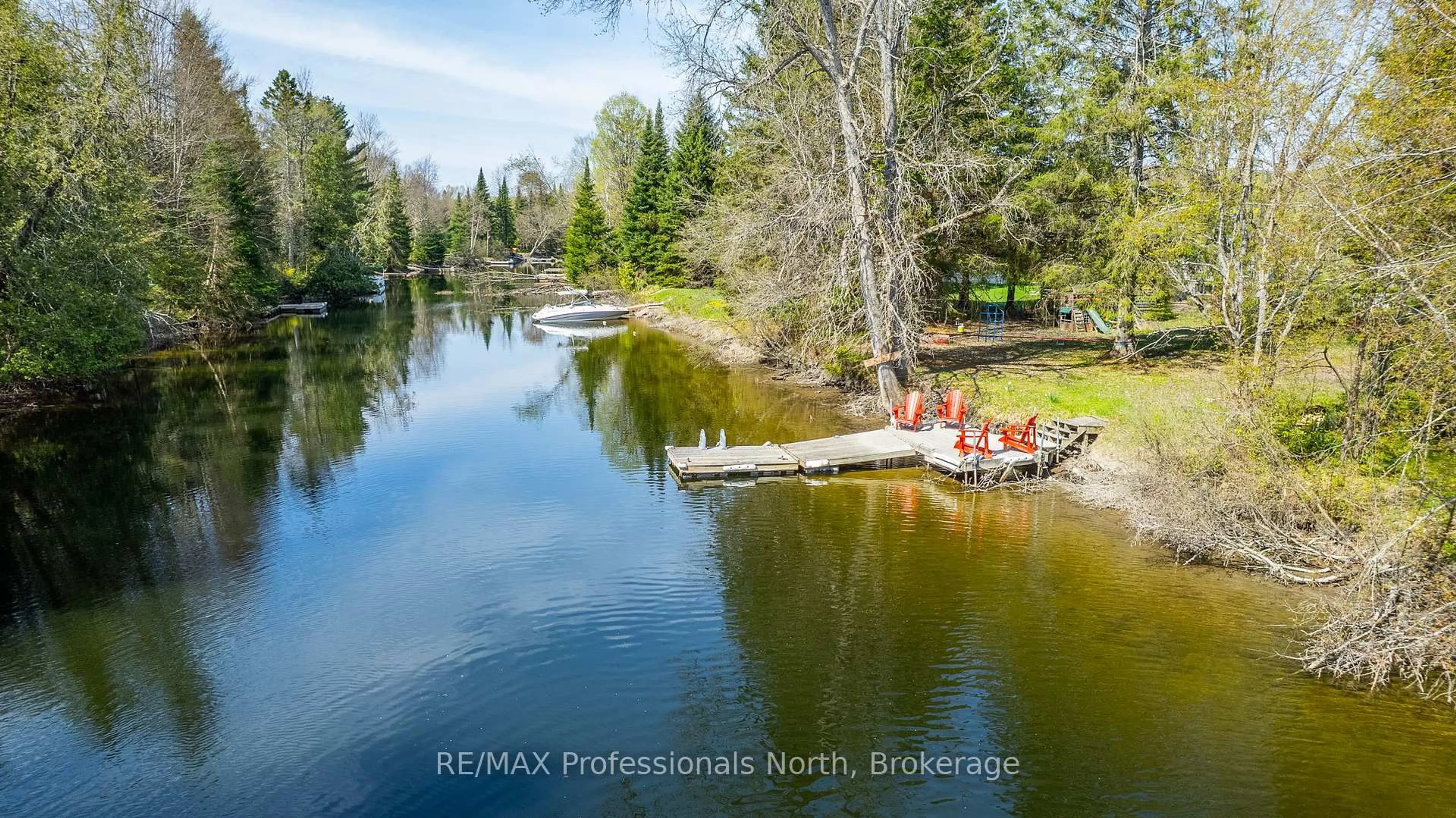 A pic from outside/outdoor area/front of a property/back of a property/a pic from drone, water/lake/river/ocean view for 1093 Tiffany Lane, Minden Hills Ontario K0M 2K0