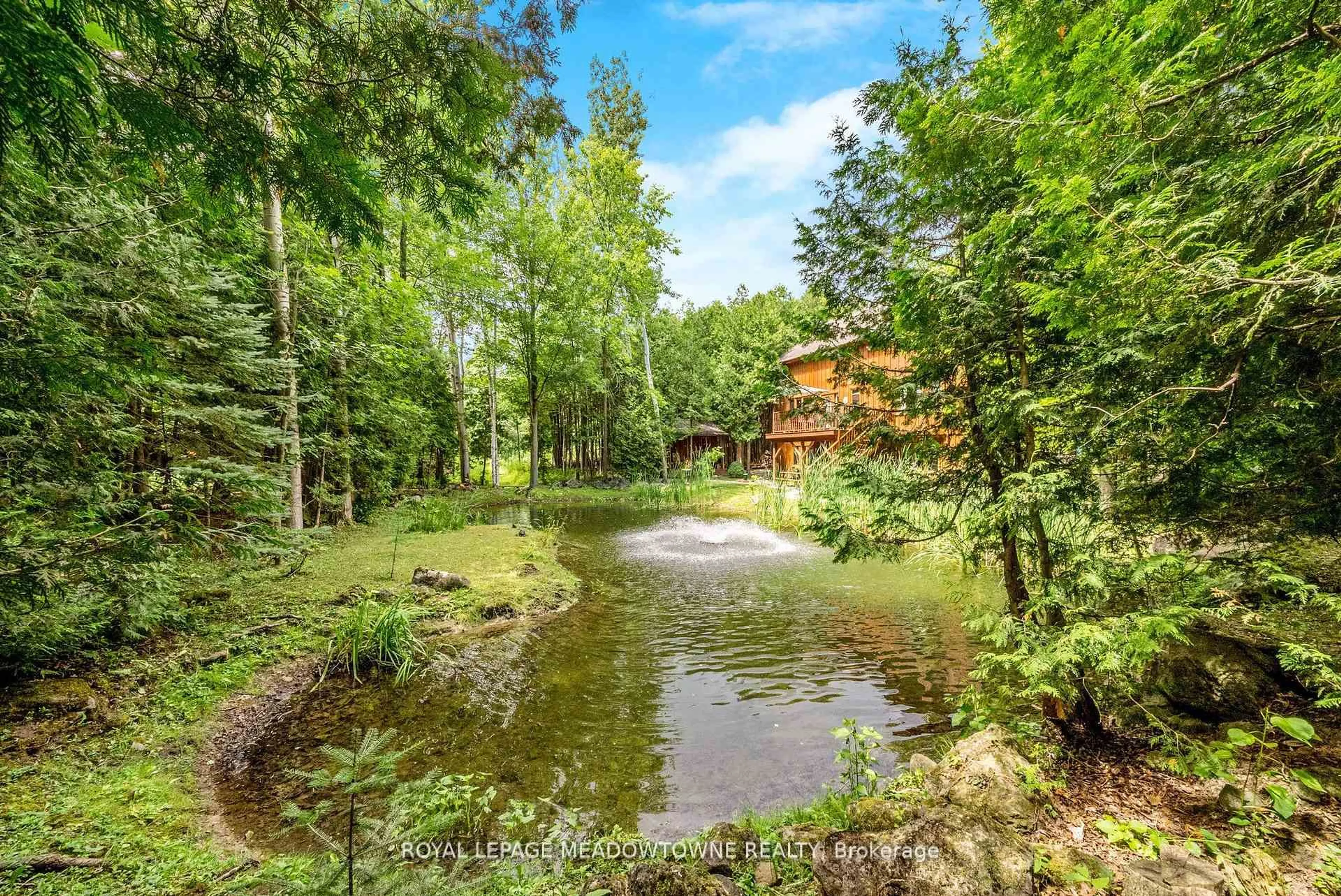 A pic from outside/outdoor area/front of a property/back of a property/a pic from drone, water/lake/river/ocean view for 4911 Eighth Line, Erin Ontario L7G 4S4