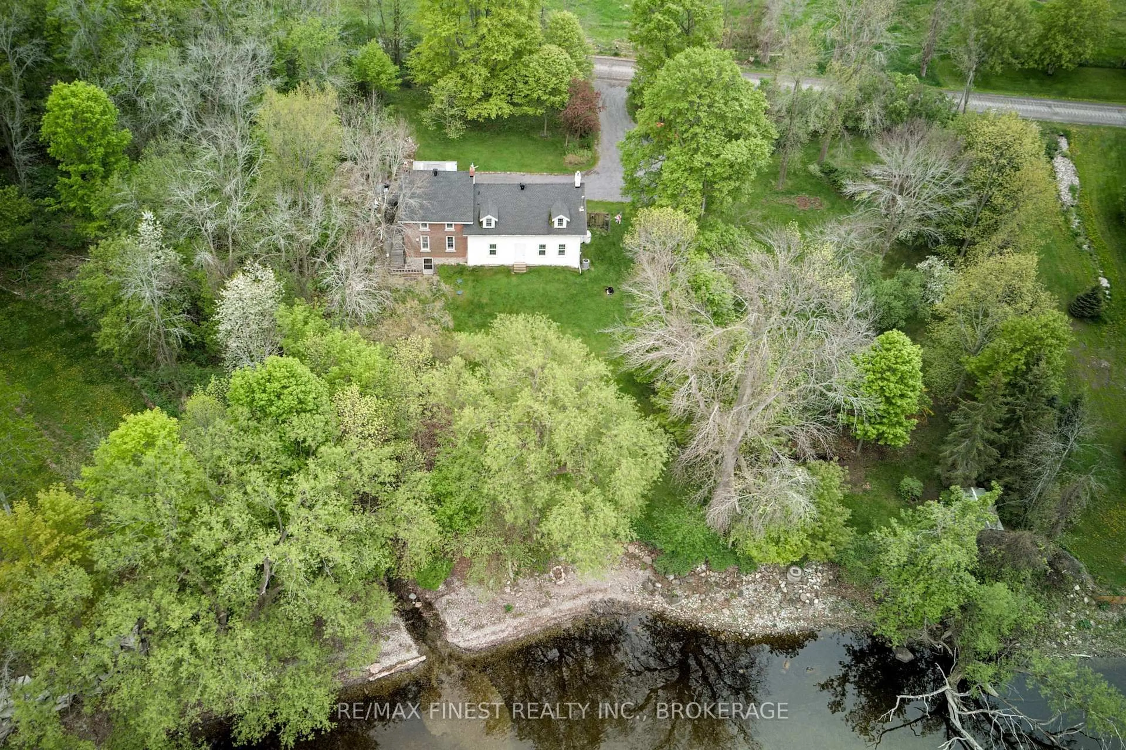 A pic from outside/outdoor area/front of a property/back of a property/a pic from drone, water/lake/river/ocean view for 2750 Front Rd, Stella Ontario K0H 2S0