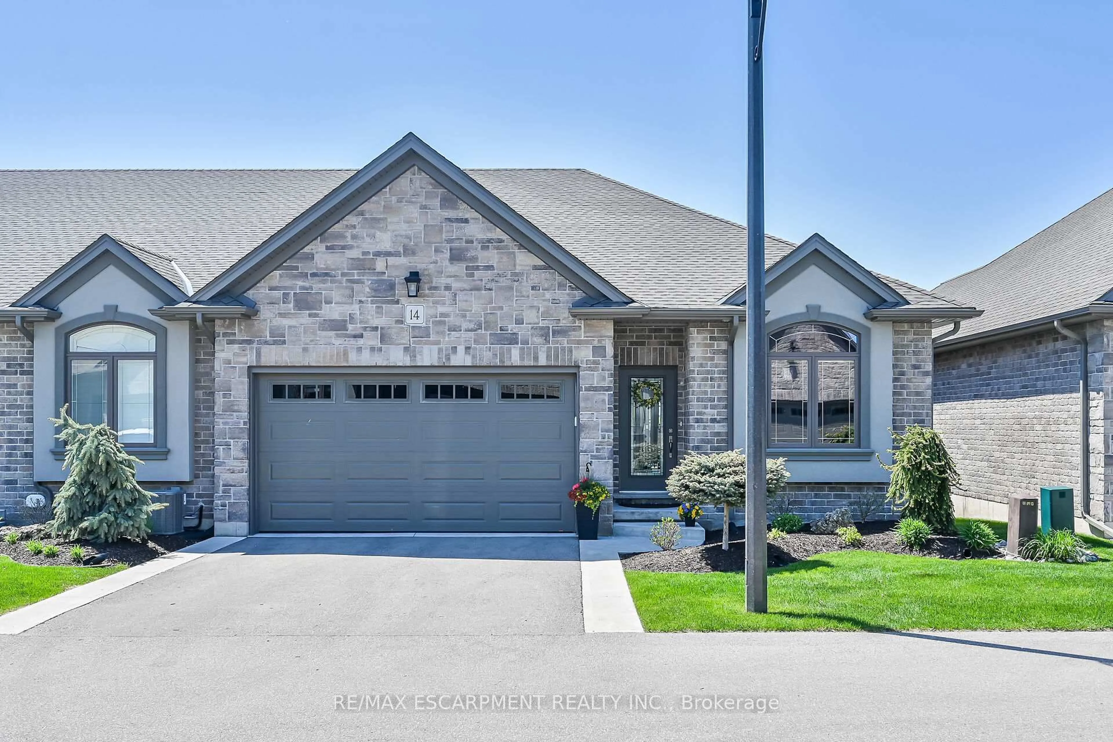 Home with brick exterior material, street for 14 Winterberry Lane, Norfolk Ontario N0E 1Y0