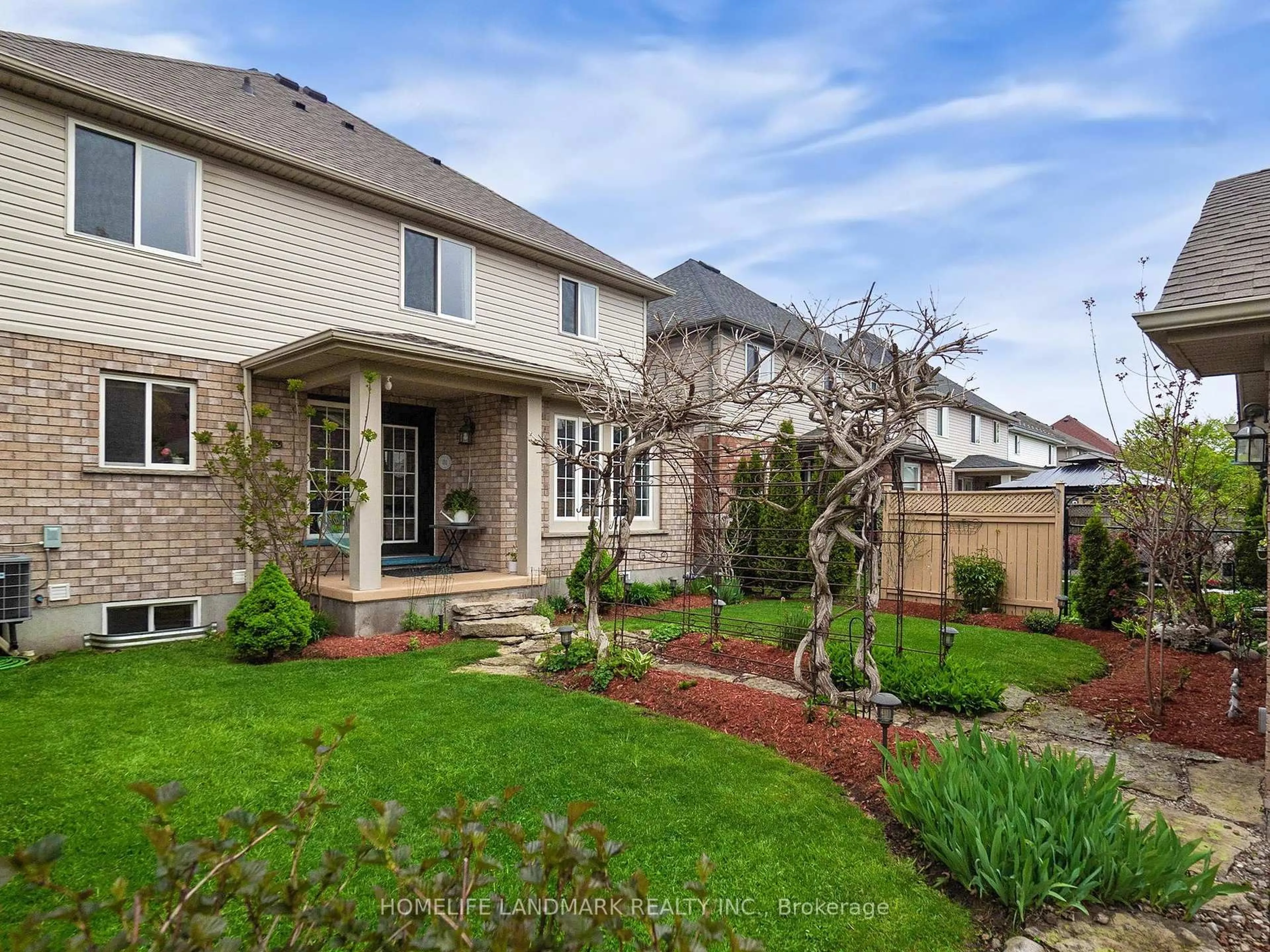 Home with brick exterior material, street for 79 Clairfields Dr, Guelph Ontario N1L 1L9