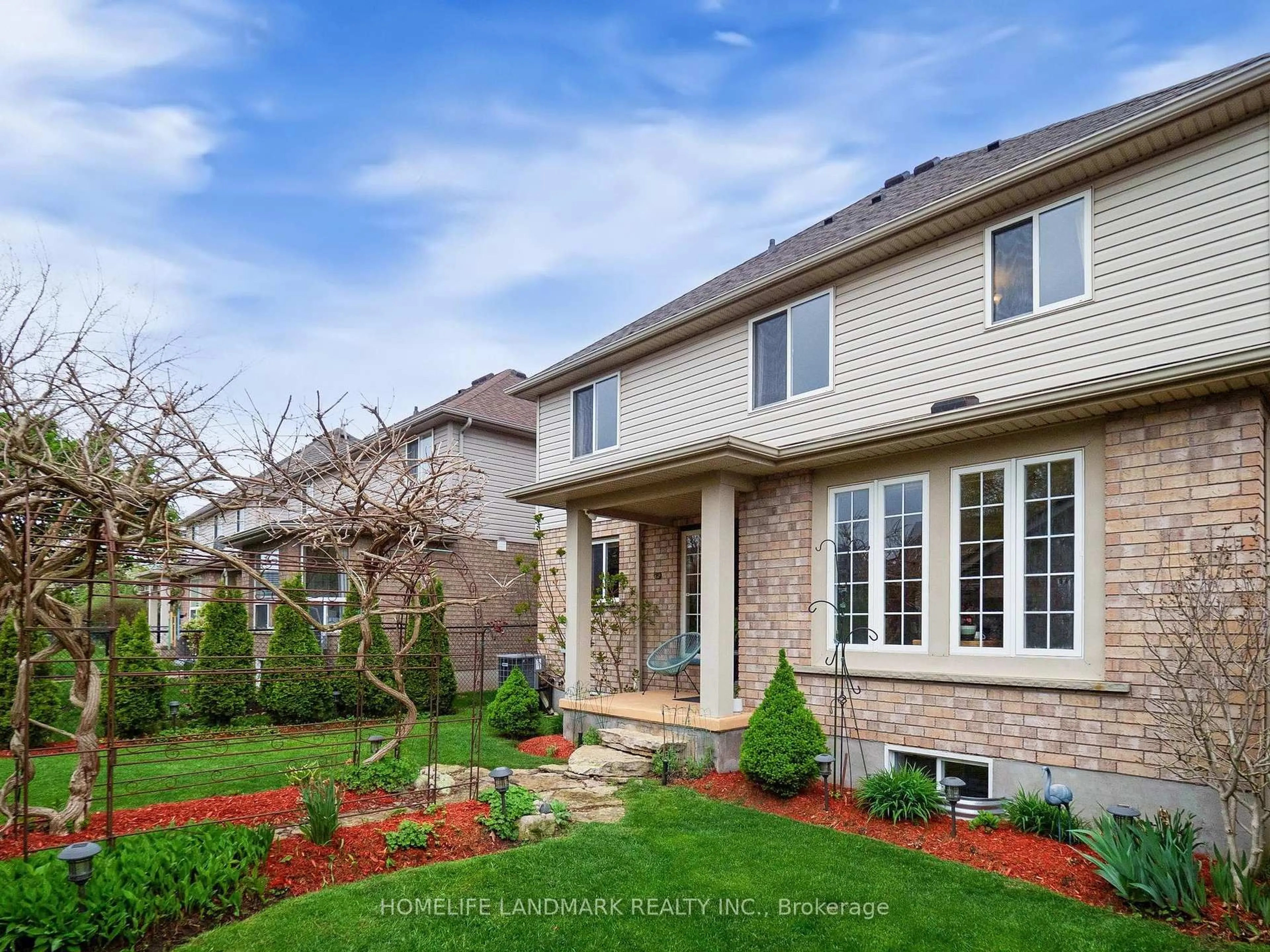 Home with brick exterior material, street for 79 Clairfields Dr, Guelph Ontario N1L 1L9