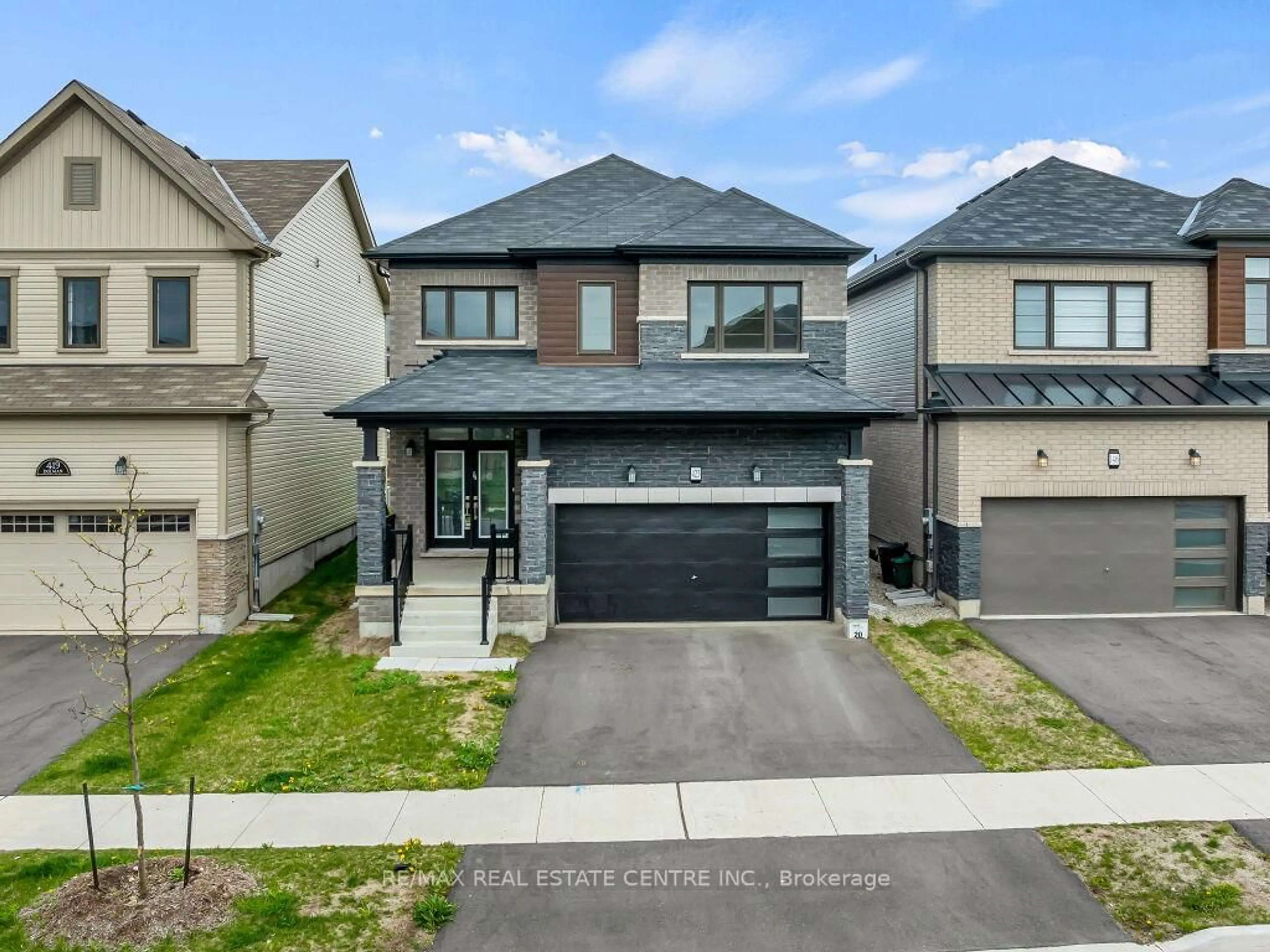 Home with brick exterior material, street for 423 Dolman St, Woolwich Ontario N0B 1M0