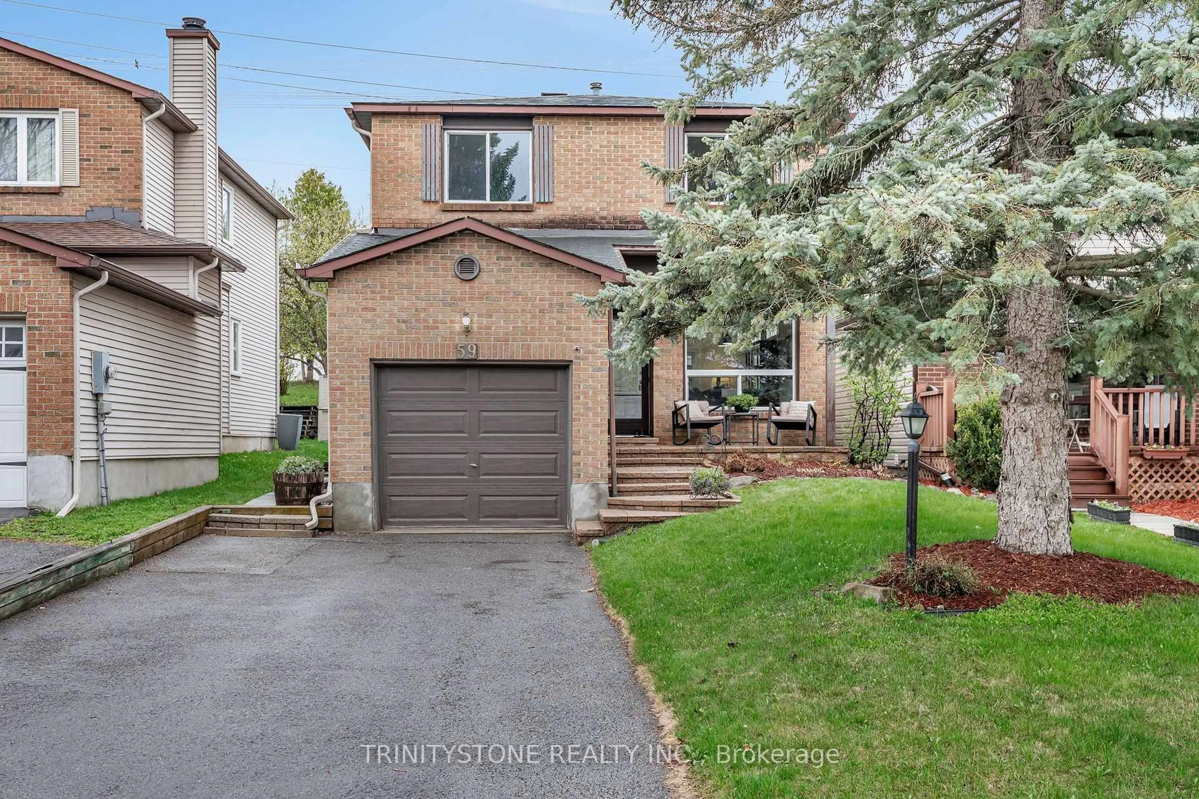 Home with brick exterior material, street for 59 Stable Way, Kanata Ontario K2M 1A8