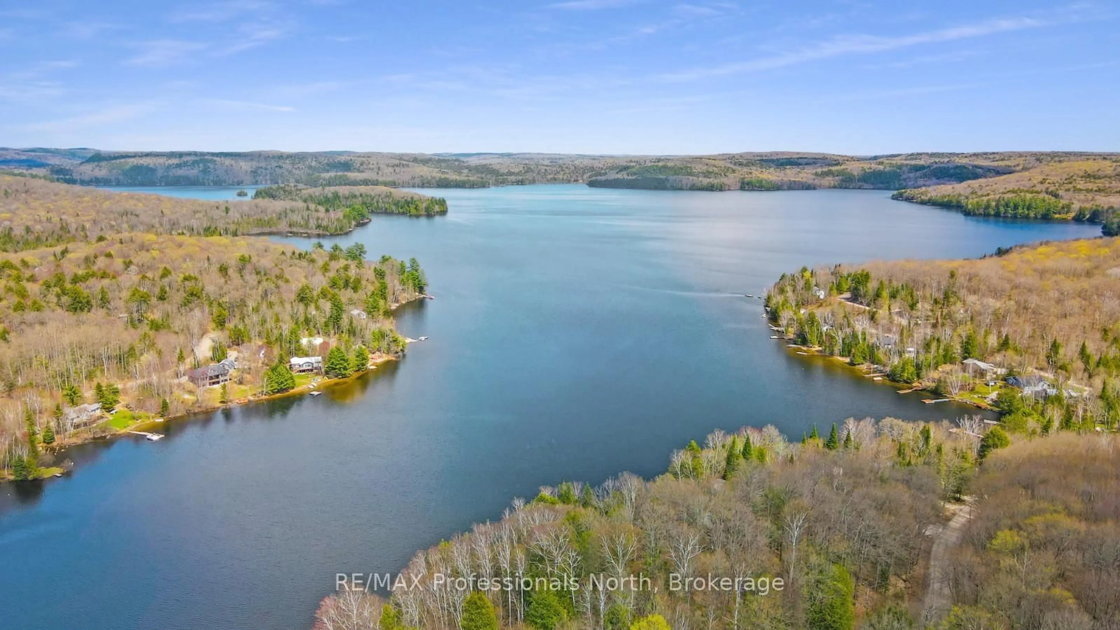 A pic from outside/outdoor area/front of a property/back of a property/a pic from drone, water/lake/river/ocean view for 1017 Dunn Rd, Dysart et al Ontario K0M 1S0