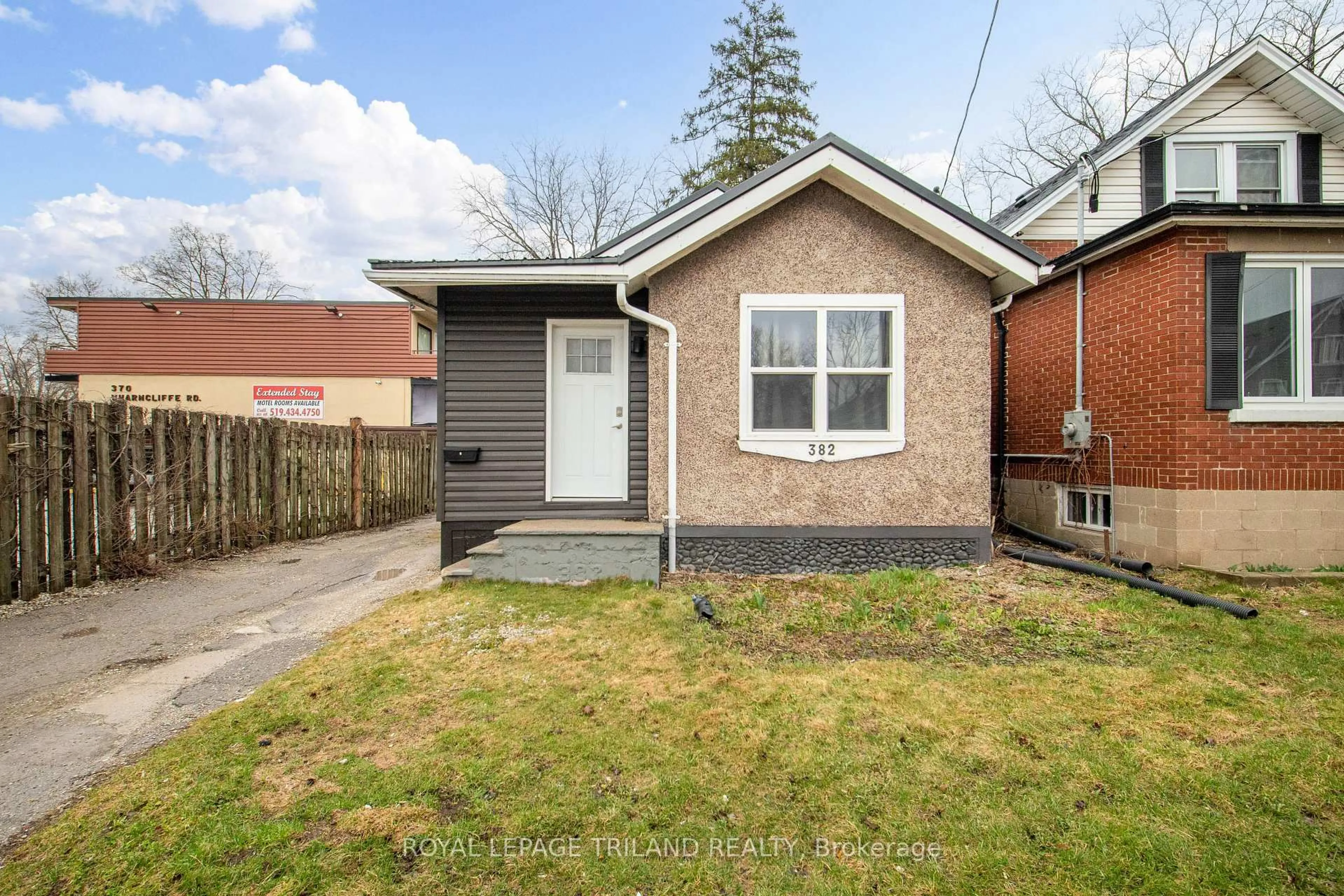 Home with brick exterior material, street for 382 Wharncliffe Rd, London South Ontario N6J 2M1
