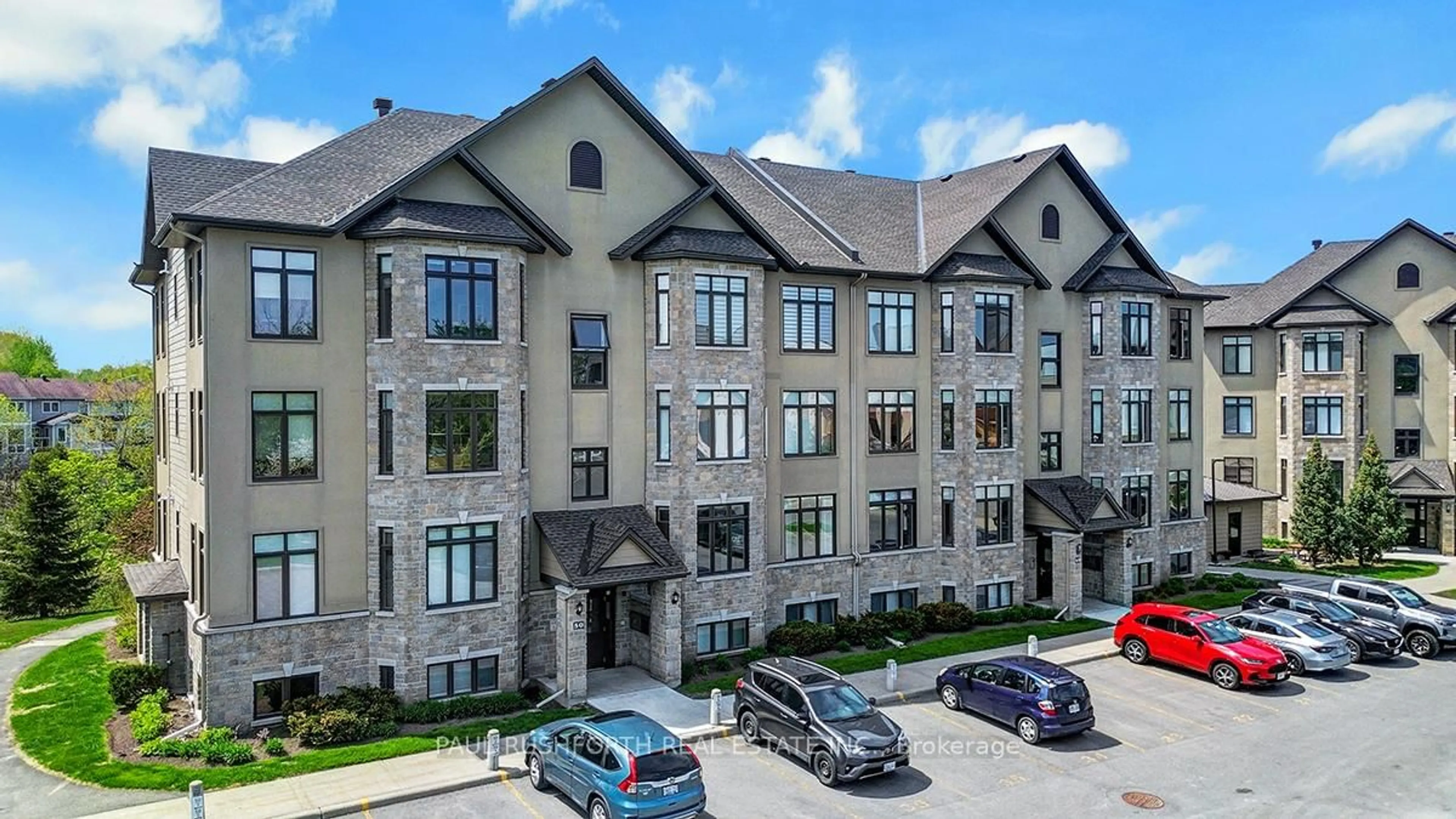 A pic from outside/outdoor area/front of a property/back of a property/a pic from drone, building for 50 Prestige Circ #4, Ottawa Ontario K4A 0W9