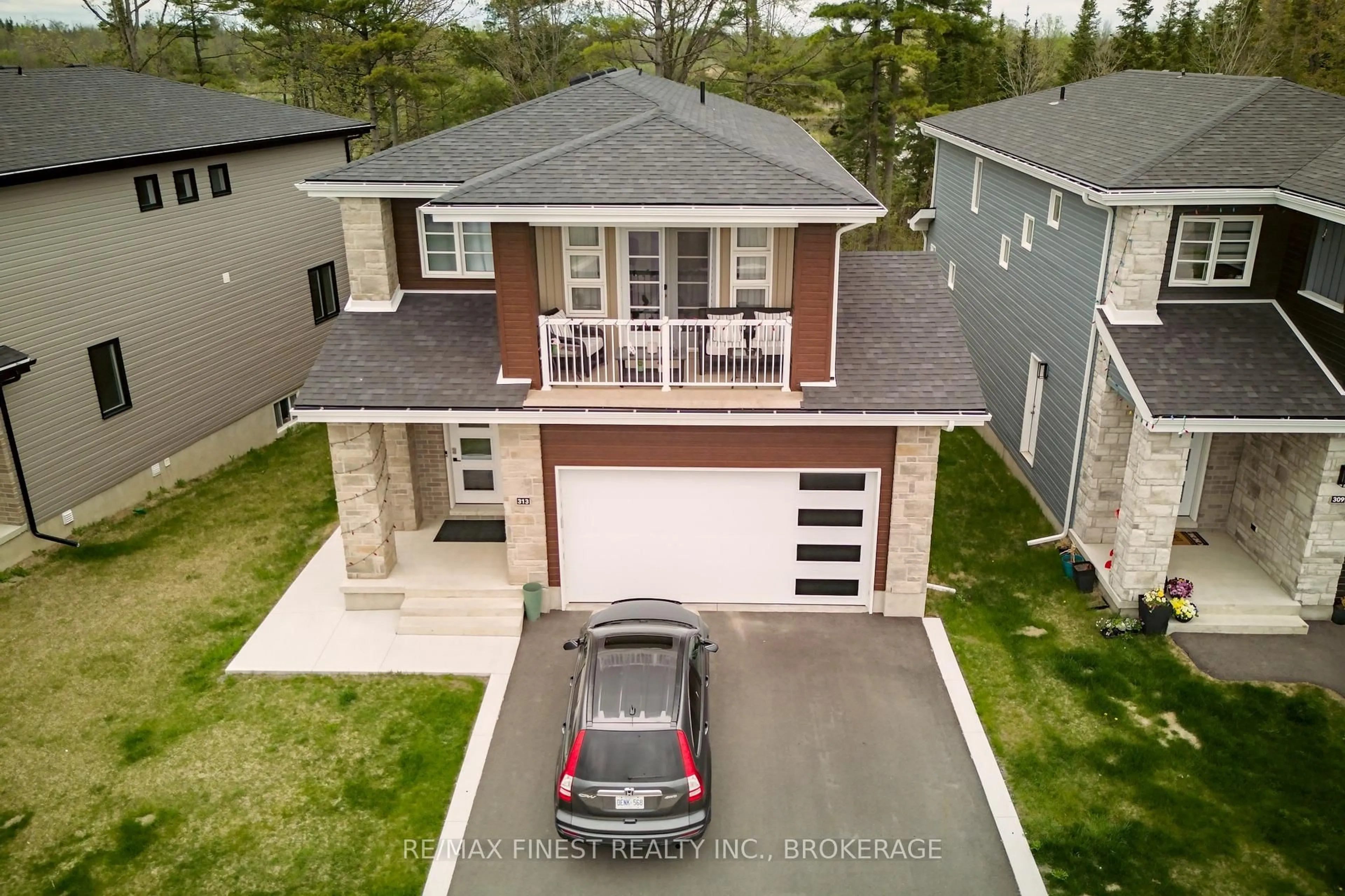 A pic from outside/outdoor area/front of a property/back of a property/a pic from drone, street for 313 Pratt Dr, Loyalist Ontario K7N 0E8