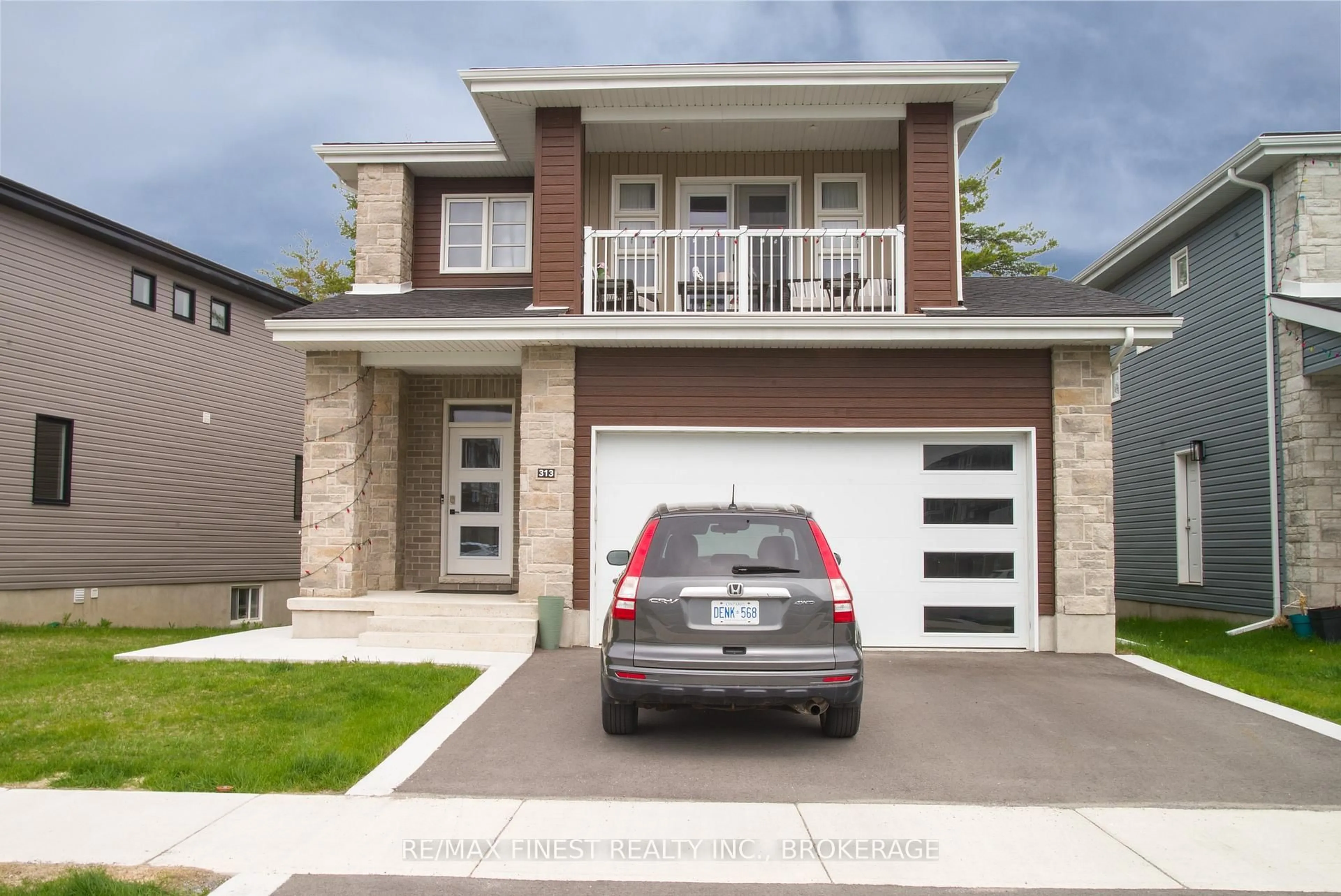 Home with brick exterior material, street for 313 Pratt Dr, Loyalist Ontario K7N 0E8