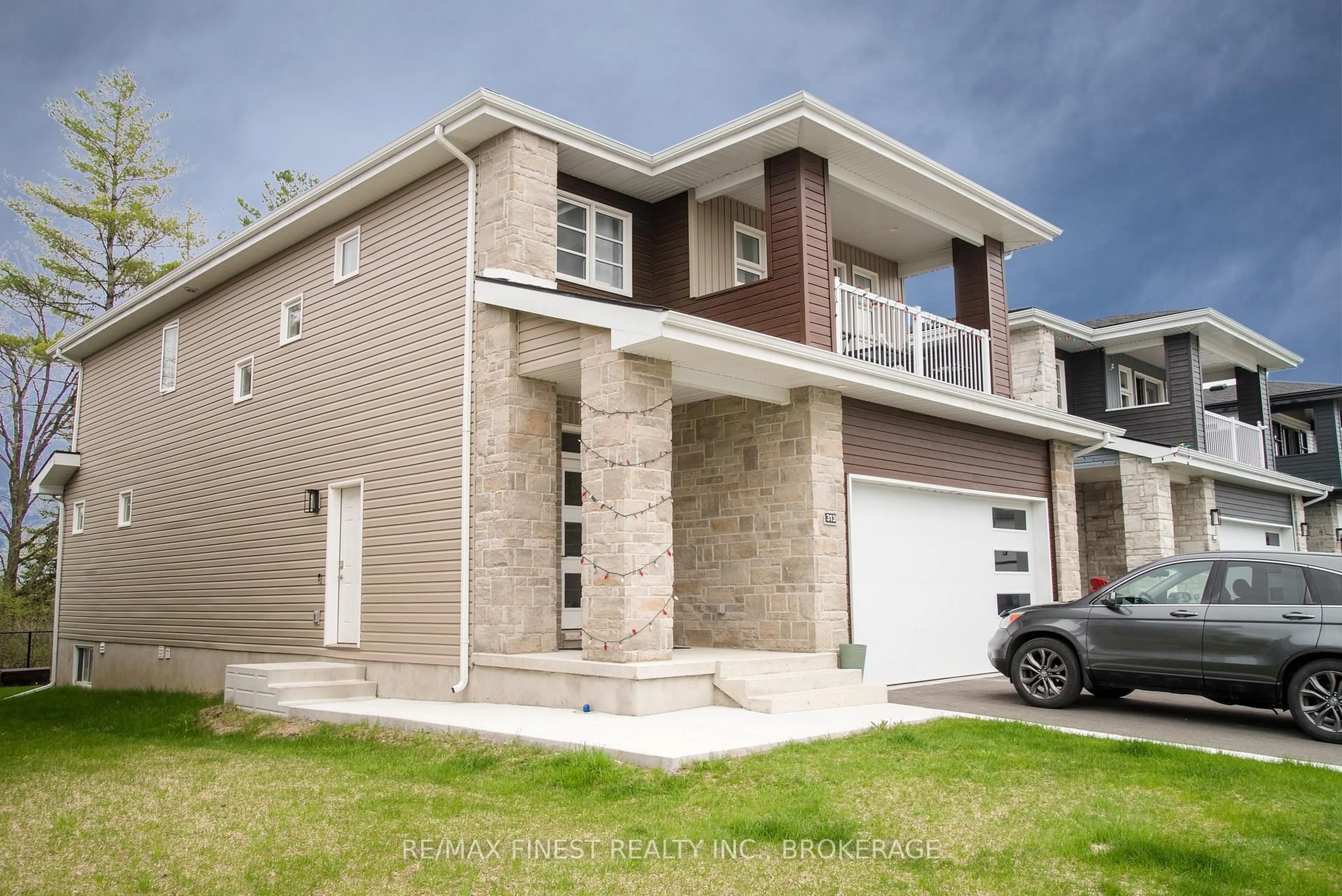 Home with brick exterior material, street for 313 Pratt Dr, Loyalist Ontario K7N 0E8