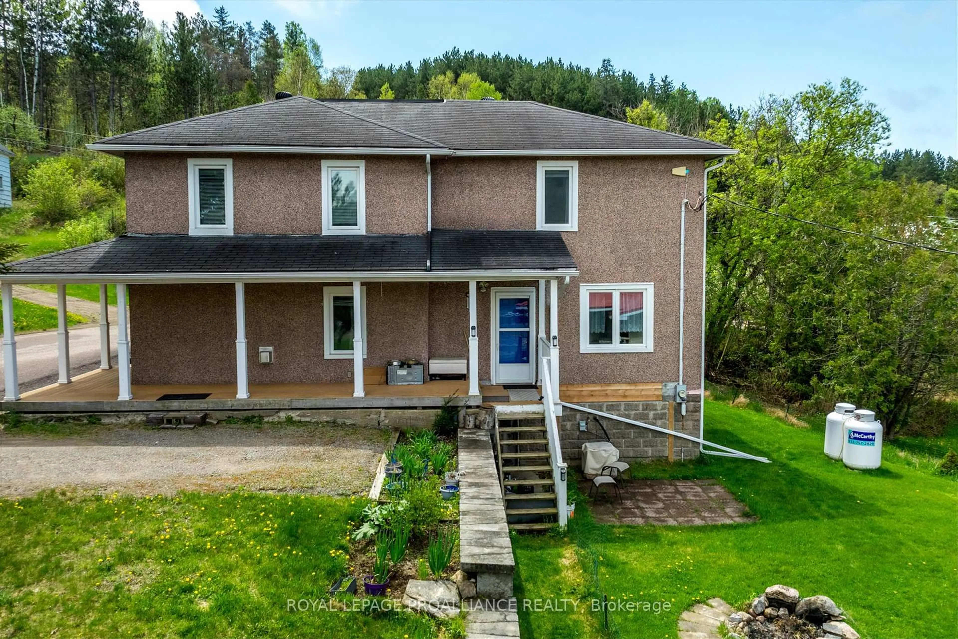 A pic from outside/outdoor area/front of a property/back of a property/a pic from drone, unknown for 14 Burchat St, Dacre Ontario K0J 1N0