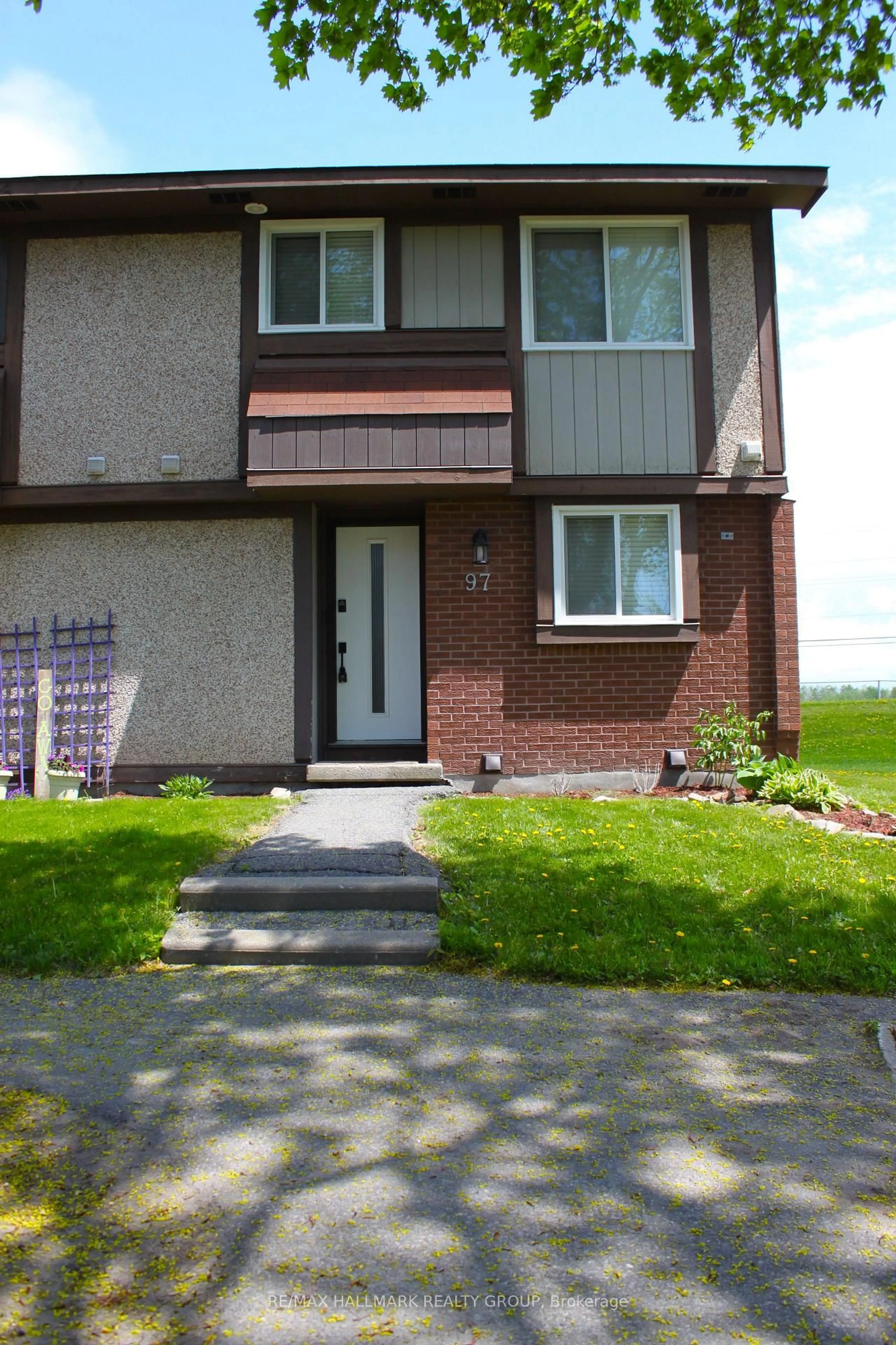Home with brick exterior material, street for 97 Pickford Dr, Ottawa Ontario K2L 2C2