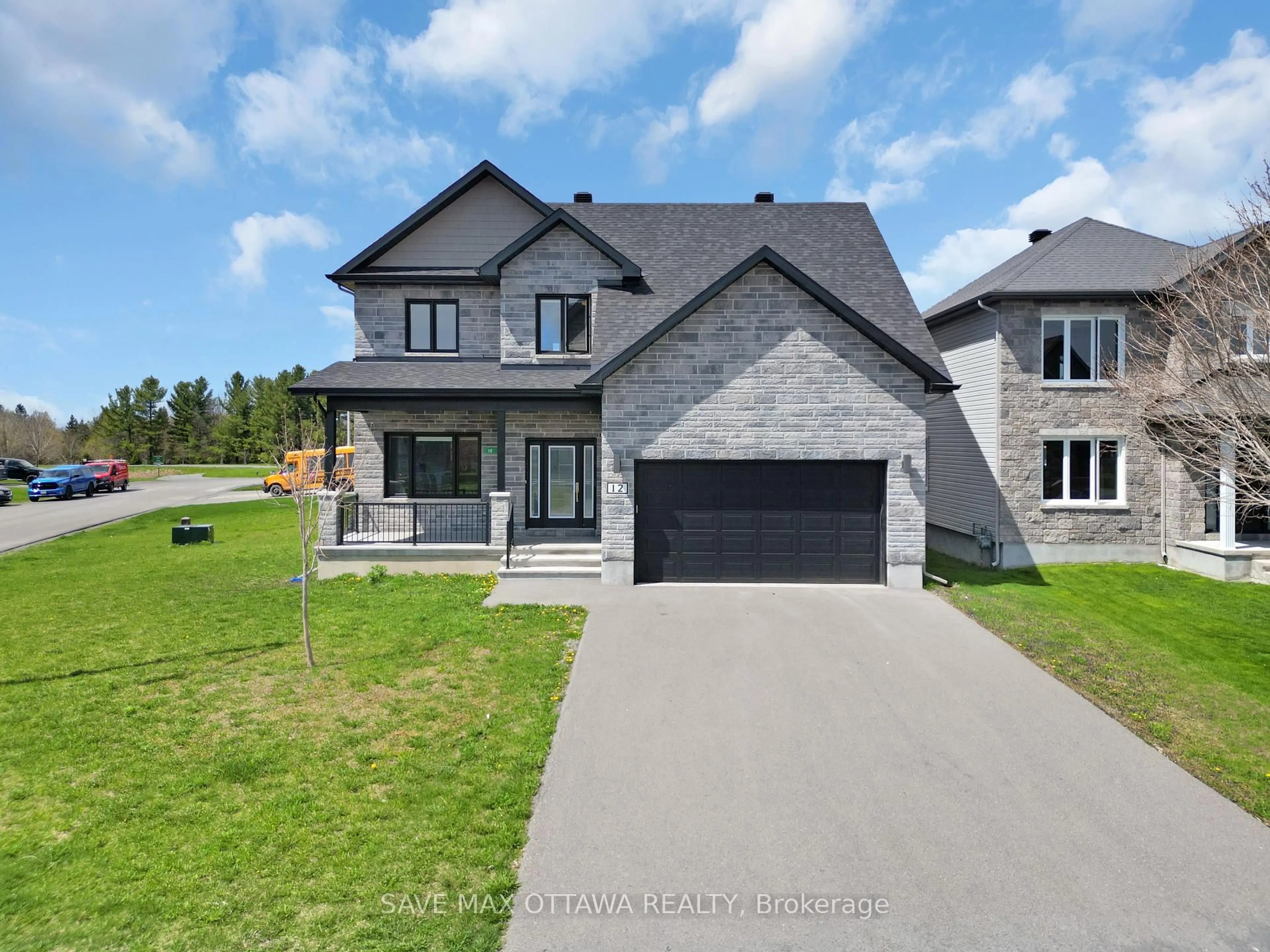 Home with brick exterior material, street for 12 Richer St, North Stormont Ontario K0A 1R0