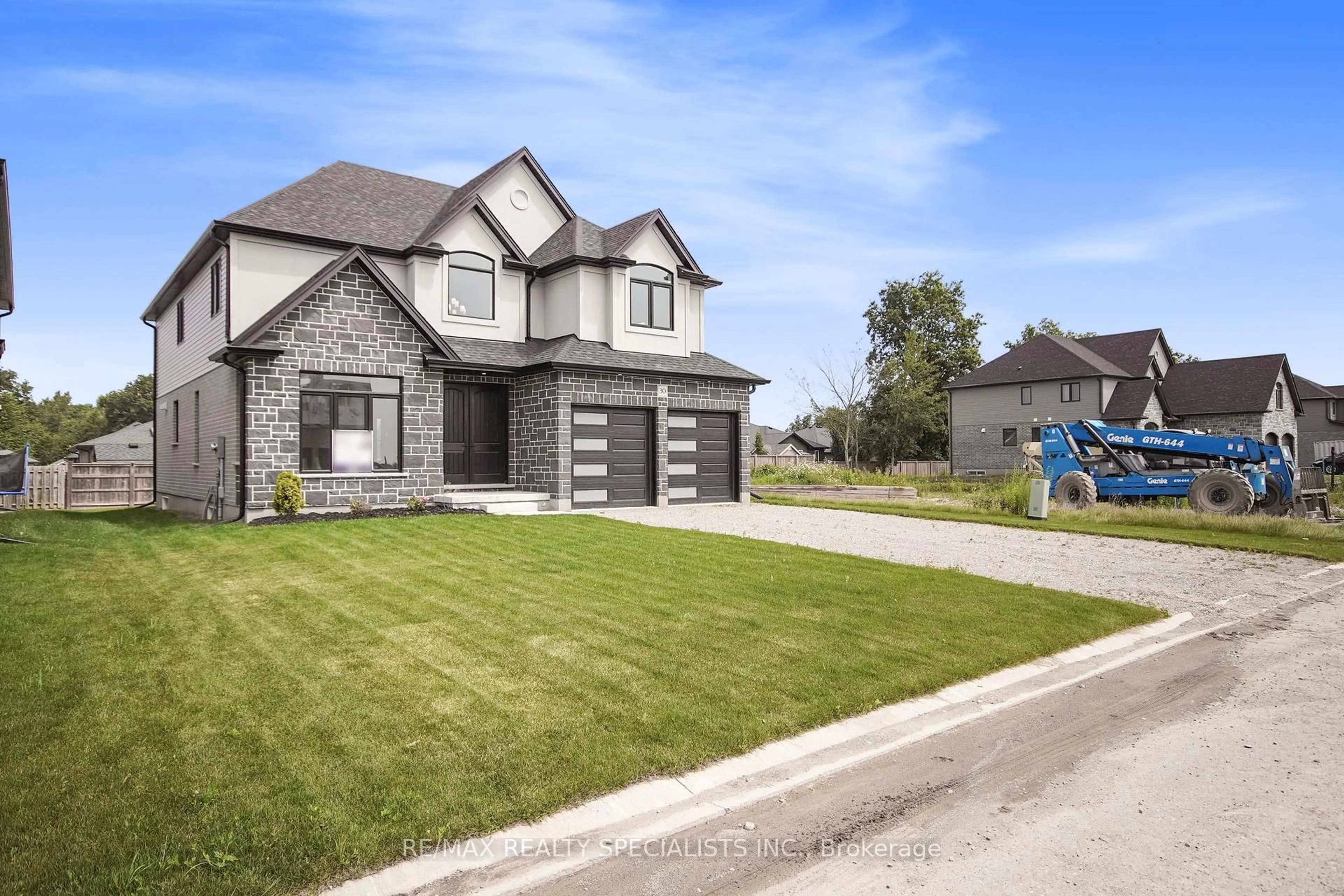 Home with brick exterior material, street for 30 Sycamore Dr, Tillsonburg Ontario N4G 5R9