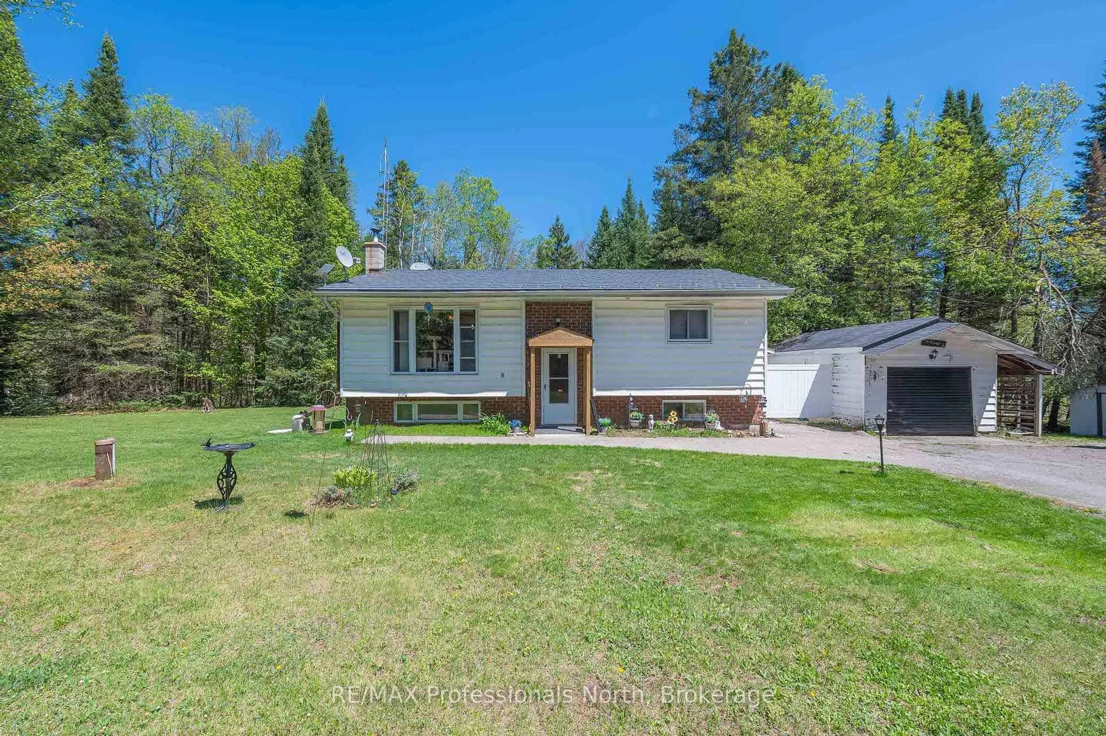 A pic from outside/outdoor area/front of a property/back of a property/a pic from drone, unknown for 1204 Bacon Rd, Minden Hills Ontario K0M 2K0