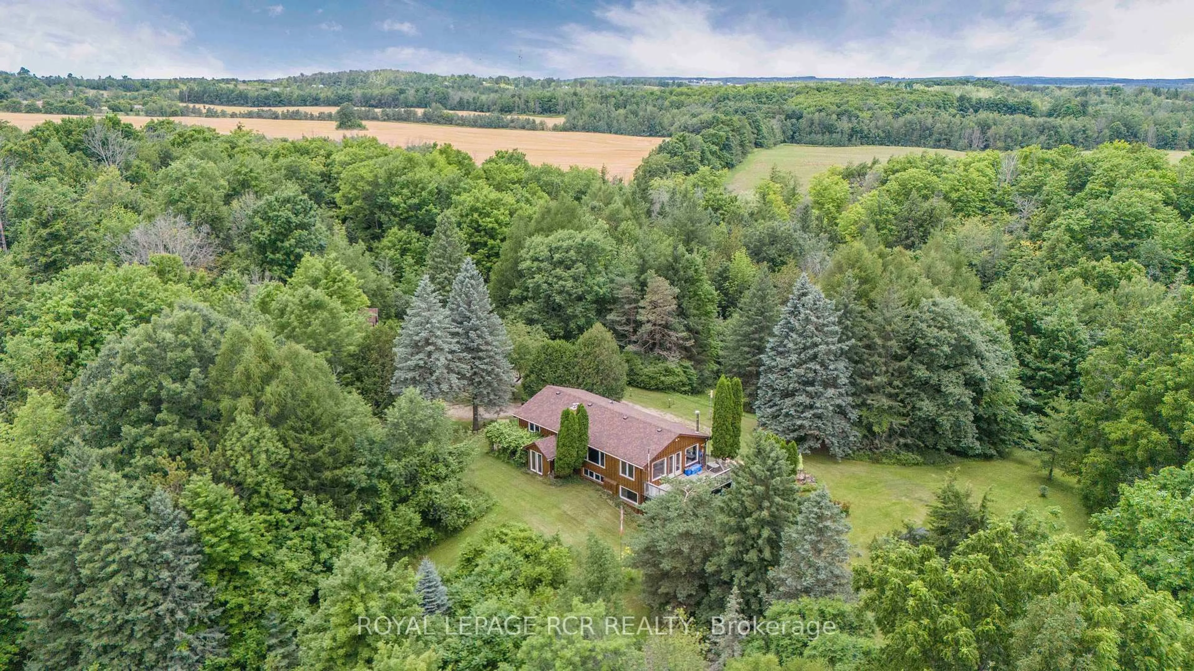 A pic from outside/outdoor area/front of a property/back of a property/a pic from drone, forest/trees view for 487072 30th Sdrd, Mono Ontario L9V 1G8