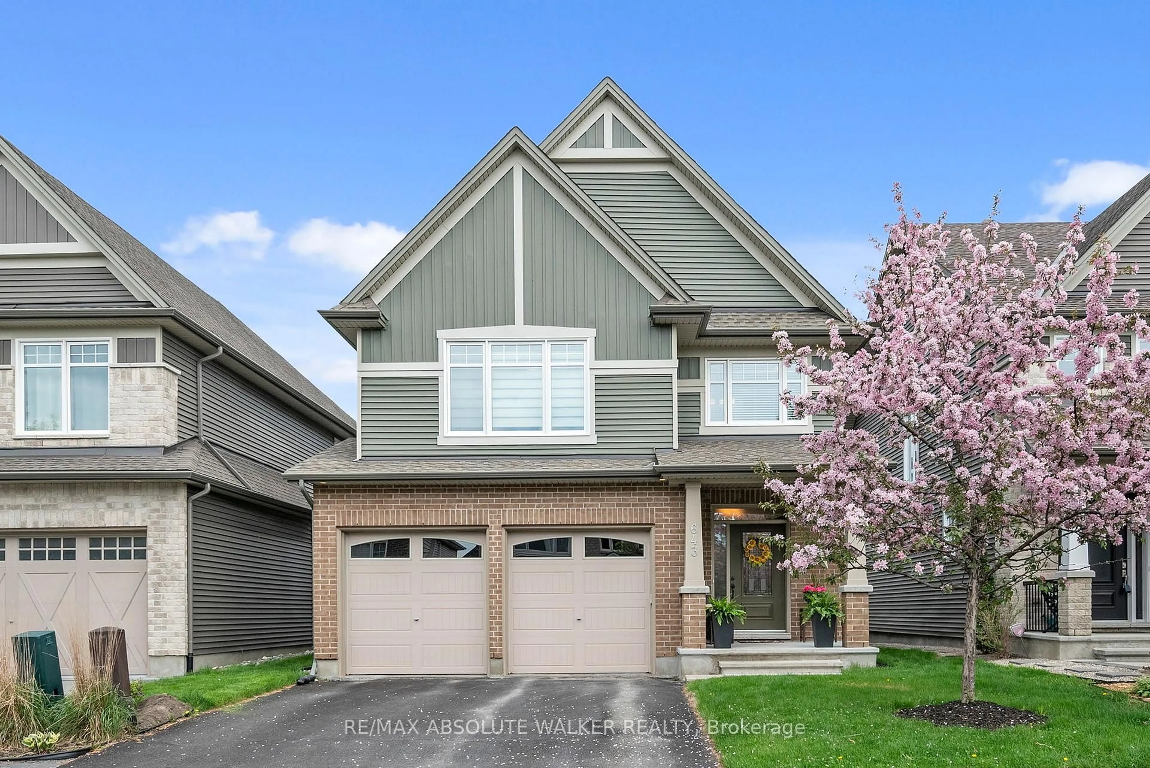 Home with vinyl exterior material, street for 643 Rockrose Way, Ottawa Ontario K1T 0K6