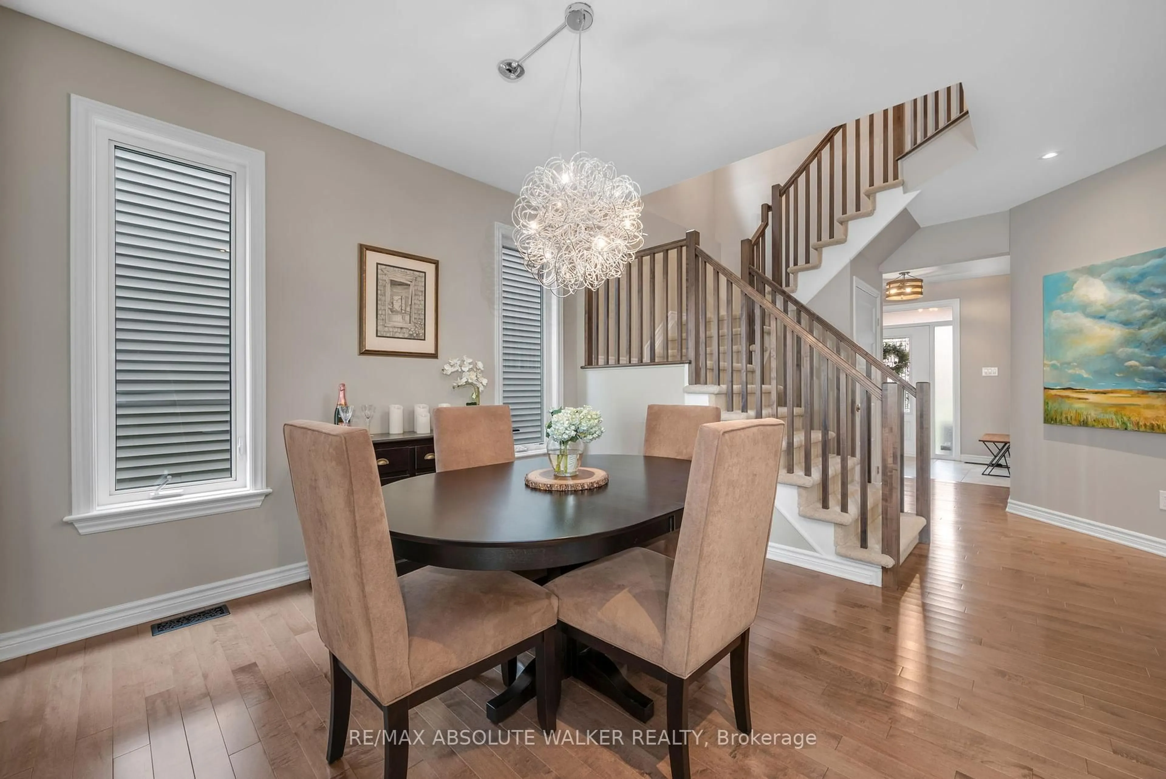 Dining room, wood/laminate floor for 643 Rockrose Way, Ottawa Ontario K1T 0K6