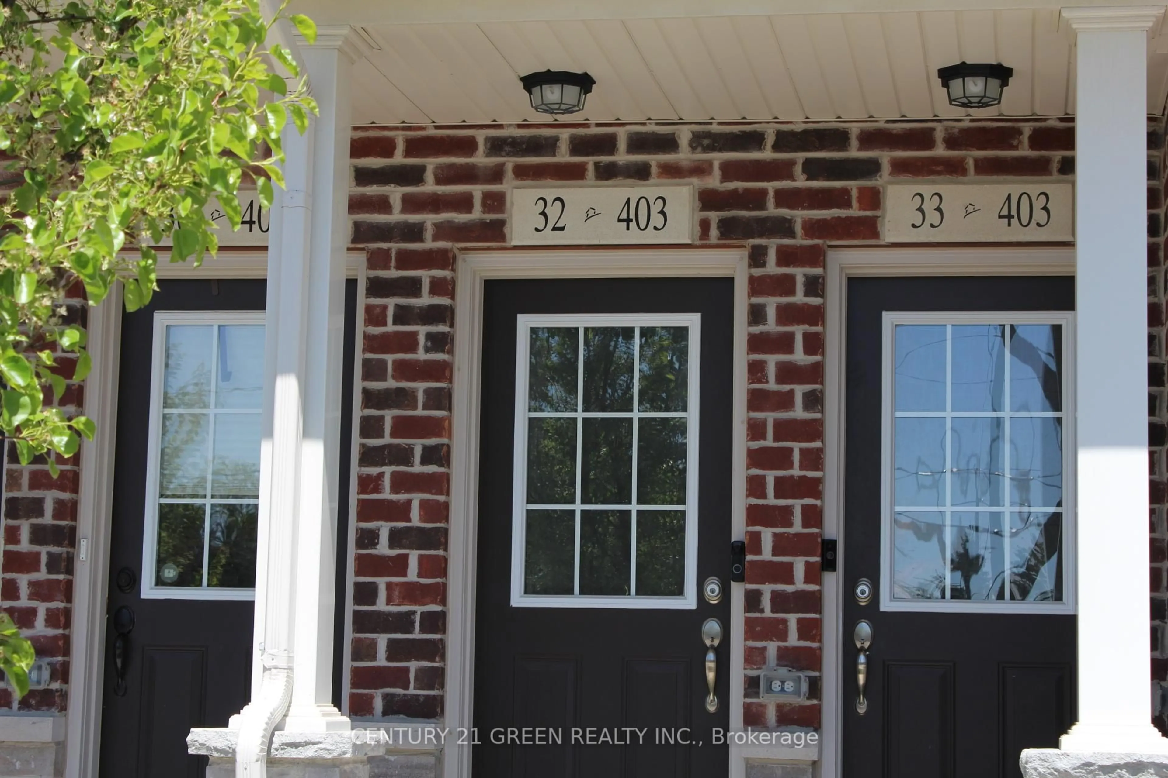Home with brick exterior material, street for 403 Westwood Dr #32, Kitchener Ontario N2M 0B5