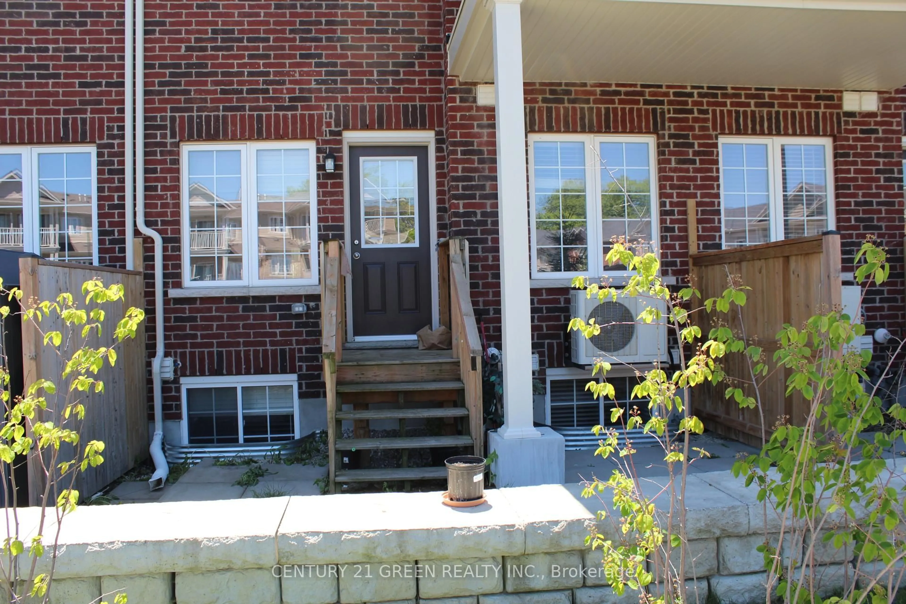 Home with brick exterior material, street for 403 Westwood Dr #32, Kitchener Ontario N2M 0B5