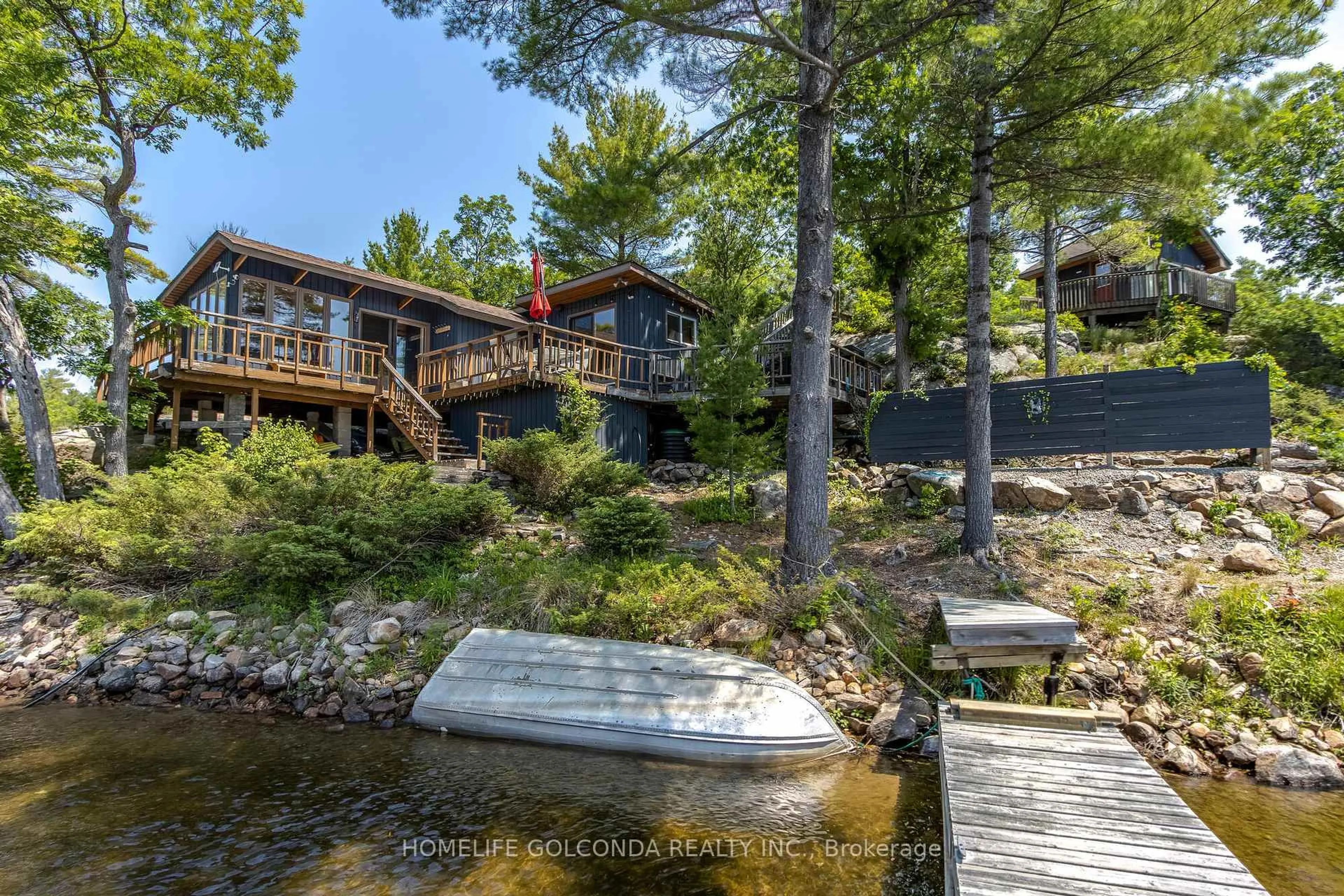 A pic from outside/outdoor area/front of a property/back of a property/a pic from drone, water/lake/river/ocean view for 1518 Island 1040/Little B, Georgian Bay Ontario P0E 1E0