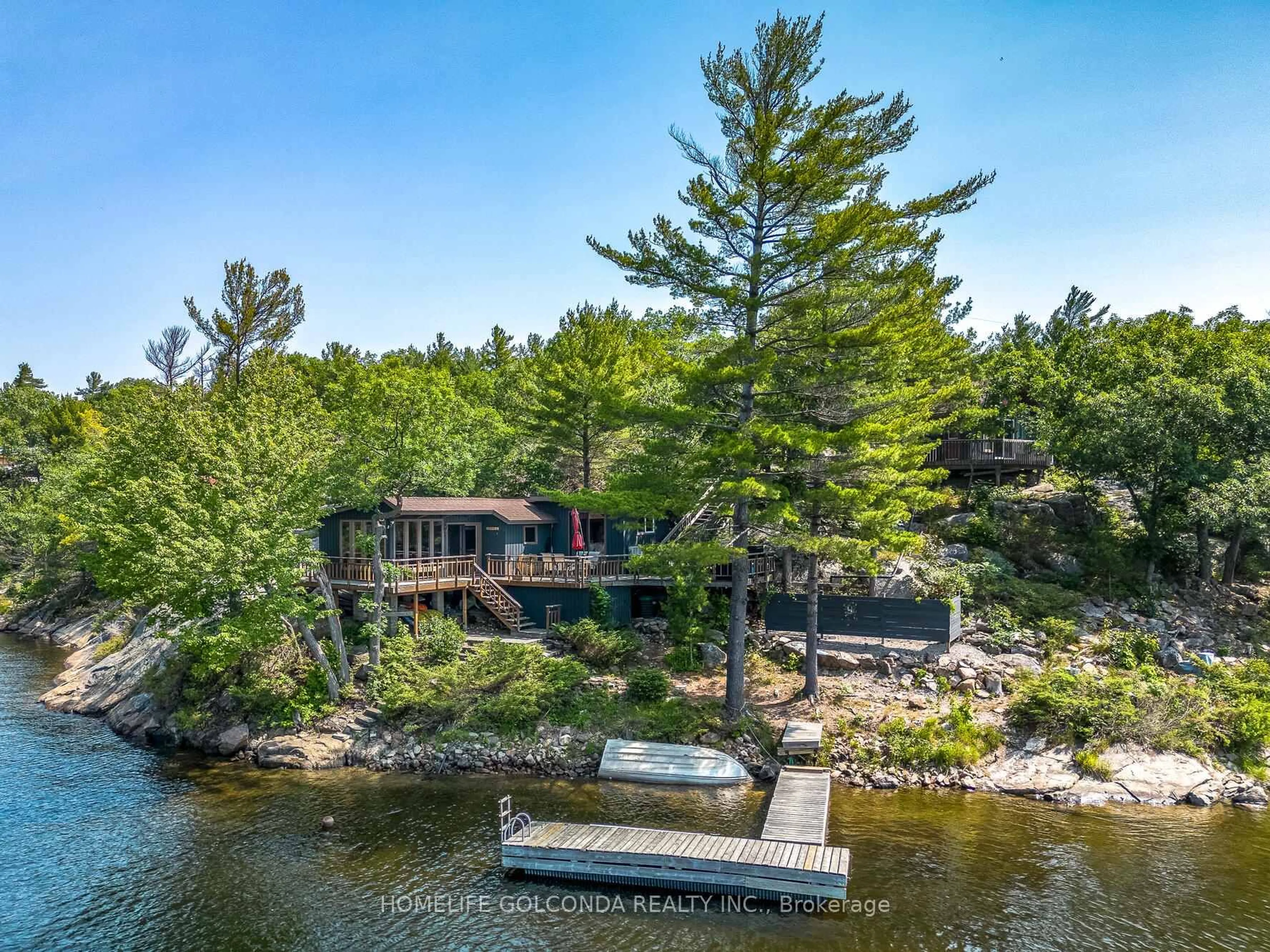 A pic from outside/outdoor area/front of a property/back of a property/a pic from drone, water/lake/river/ocean view for 1518 Island 1040/Little B, Georgian Bay Ontario P0E 1E0