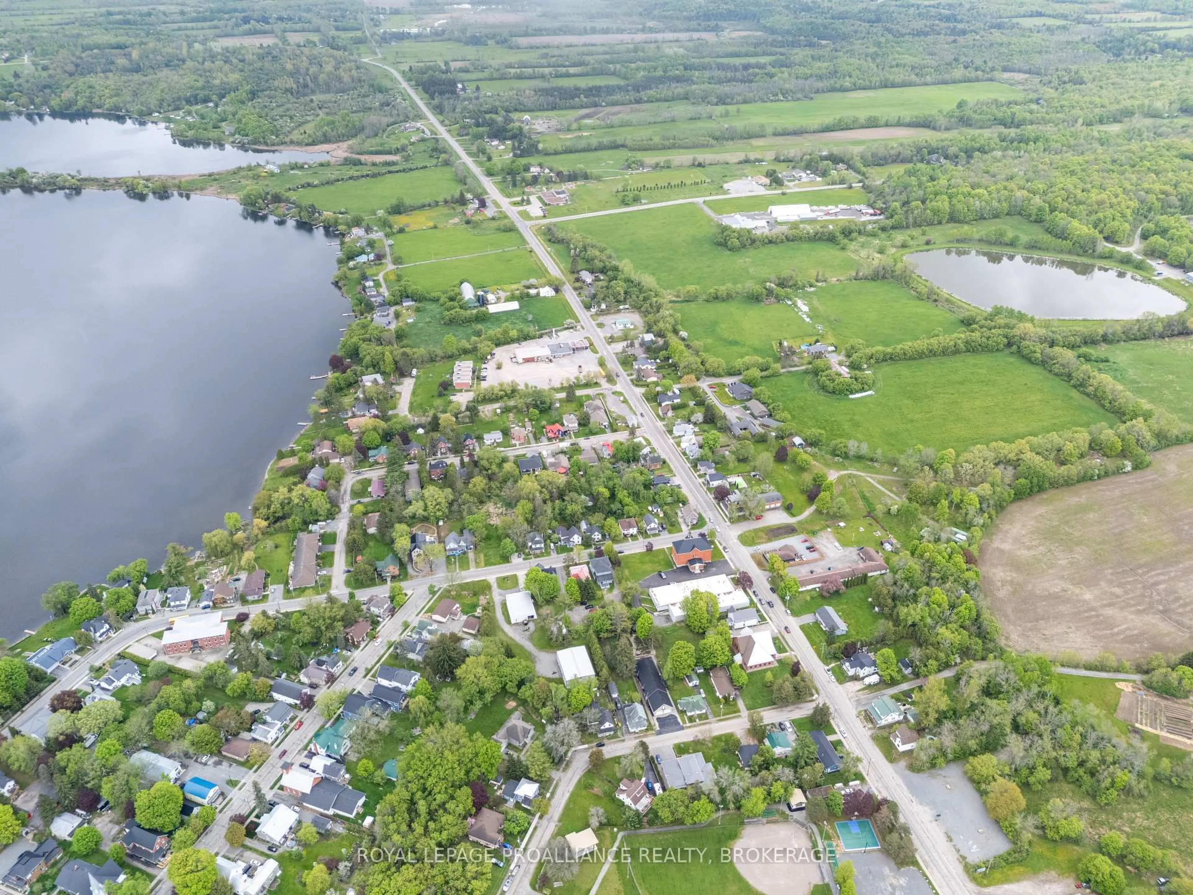 A pic from outside/outdoor area/front of a property/back of a property/a pic from drone, water/lake/river/ocean view for 26 Rideau St, Westport Ontario K0G 1X0