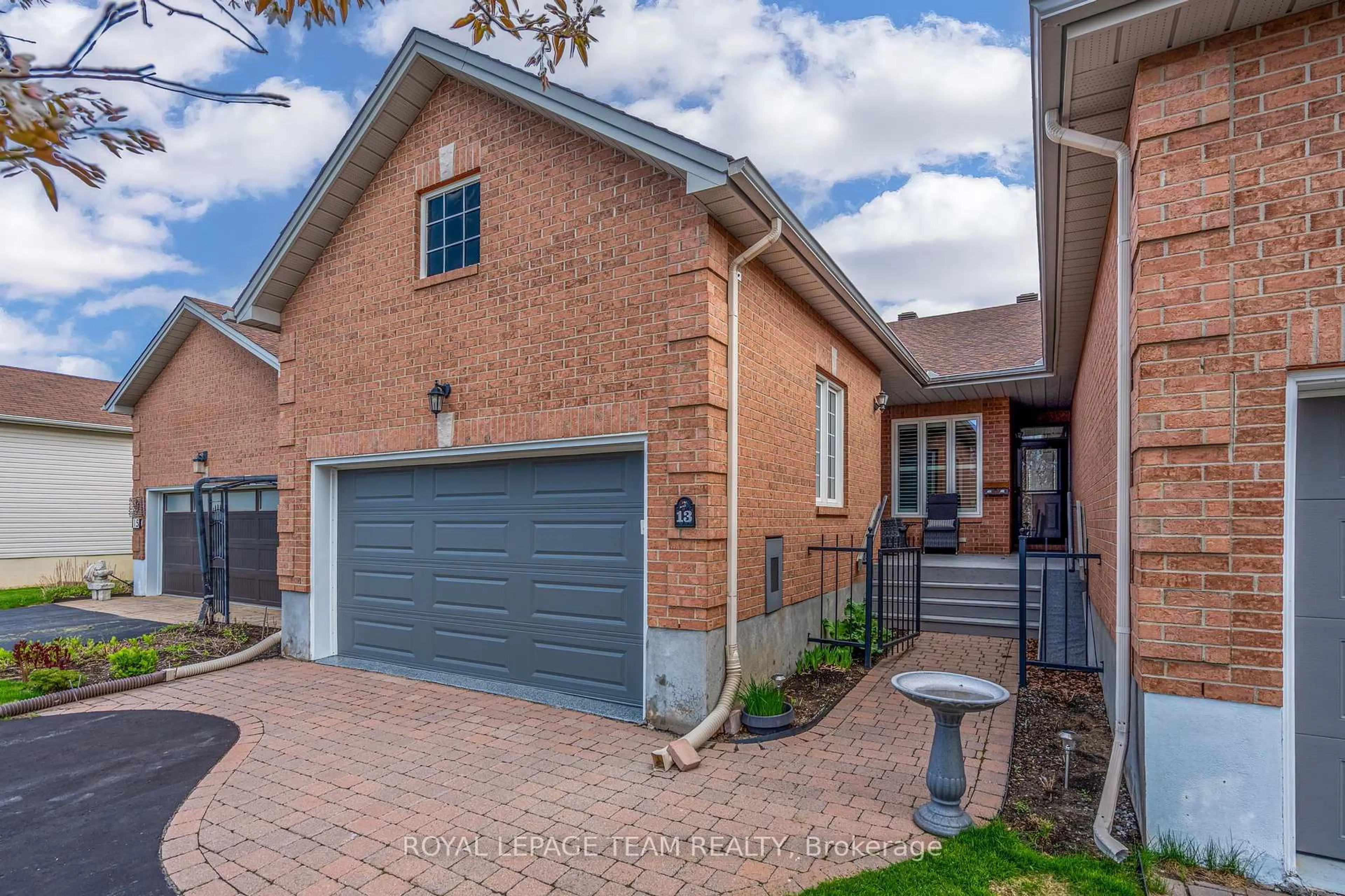 Home with brick exterior material, street for 13 Eileen Cres, Stittsville Ontario K2S 1M3