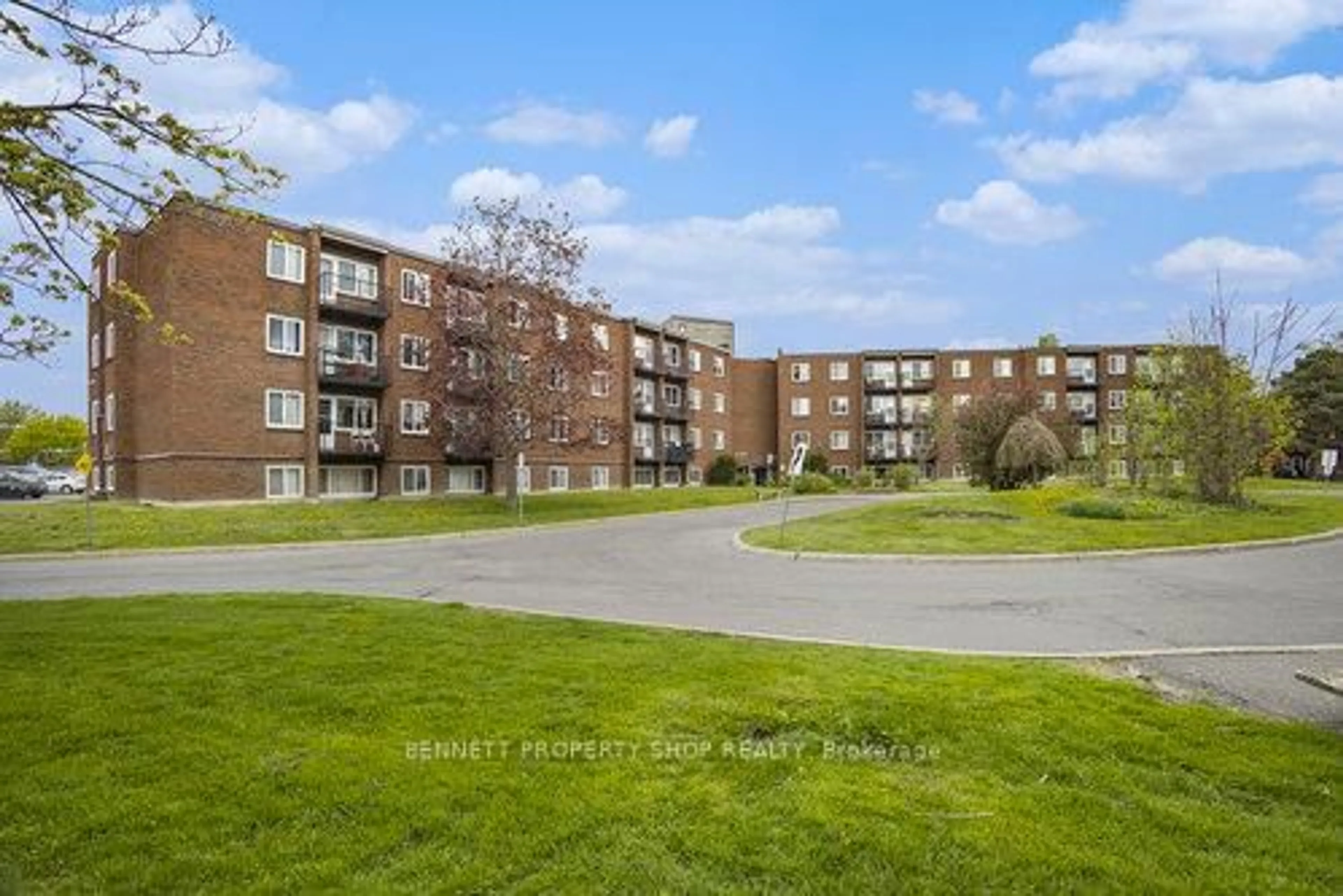A pic from outside/outdoor area/front of a property/back of a property/a pic from drone, water/lake/river/ocean view for 2041 Arrowsmith Dr #206, Ottawa Ontario K1J 7V7