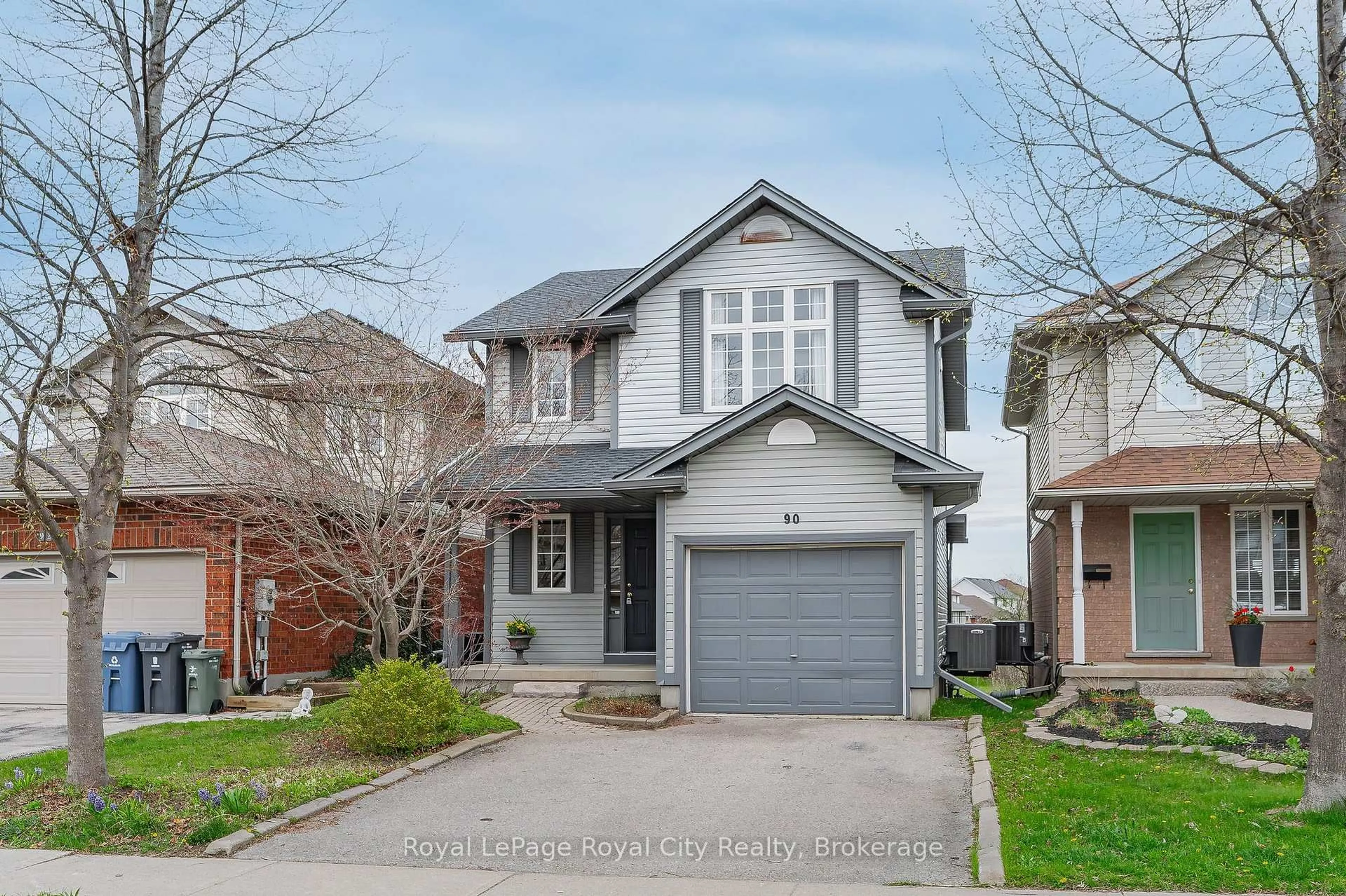 Home with brick exterior material, street for 90 Doyle Dr, Guelph Ontario N1G 5B9