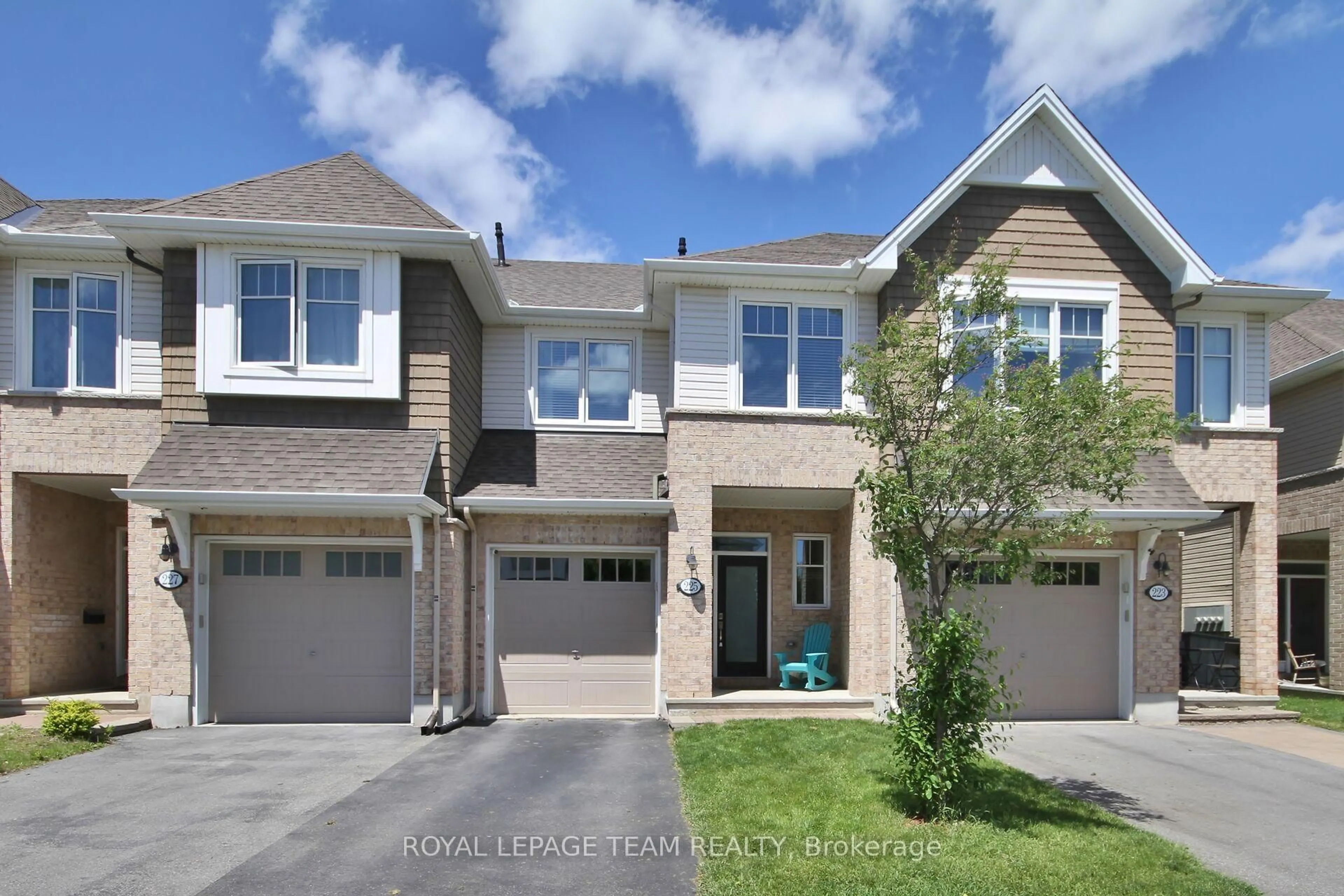 Home with brick exterior material, street for 225 Brambling Way, Ottawa Ontario K2J 6E3