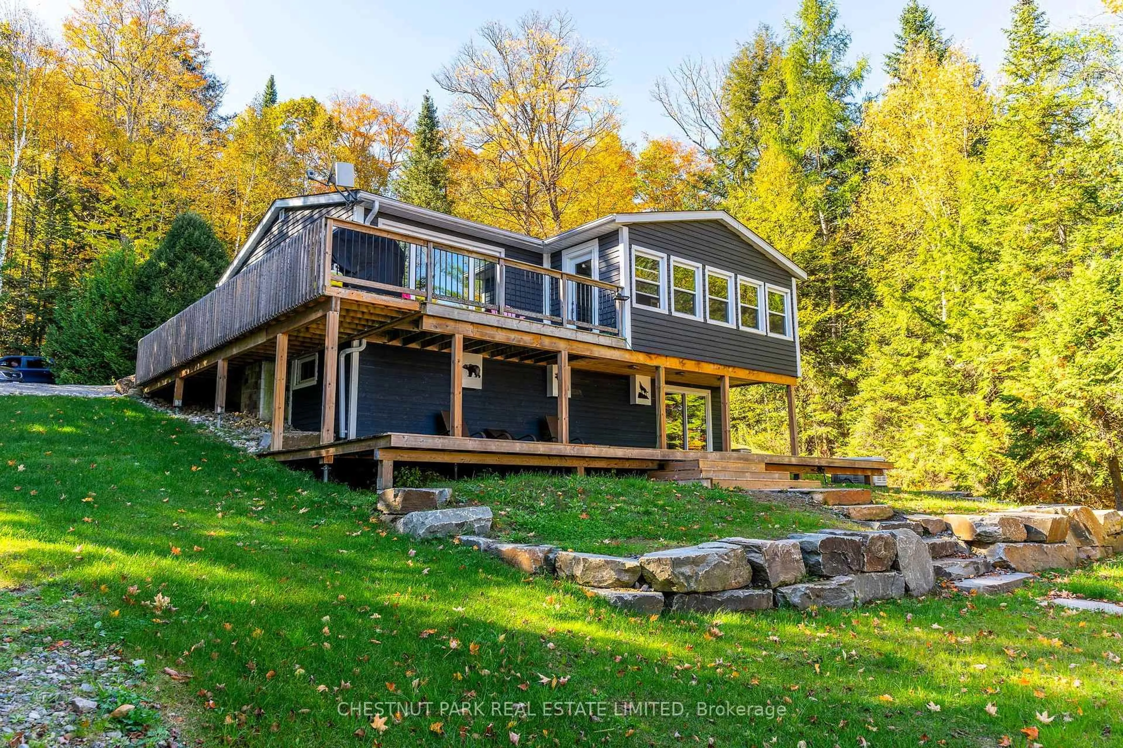 A pic from outside/outdoor area/front of a property/back of a property/a pic from drone, water/lake/river/ocean view for 1060 Inawendawin Rd, Lake of Bays Ontario P0A 1E0